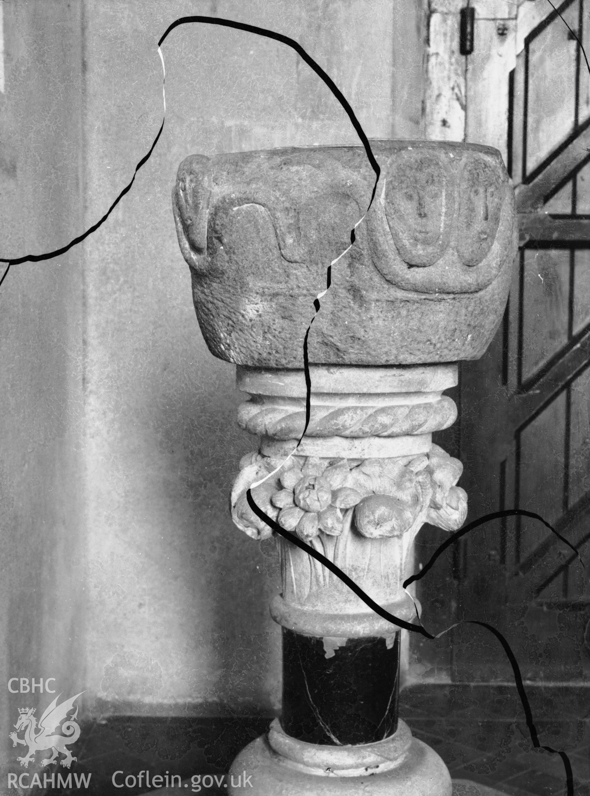 Black and white photo showing the font at Cenarth Church.