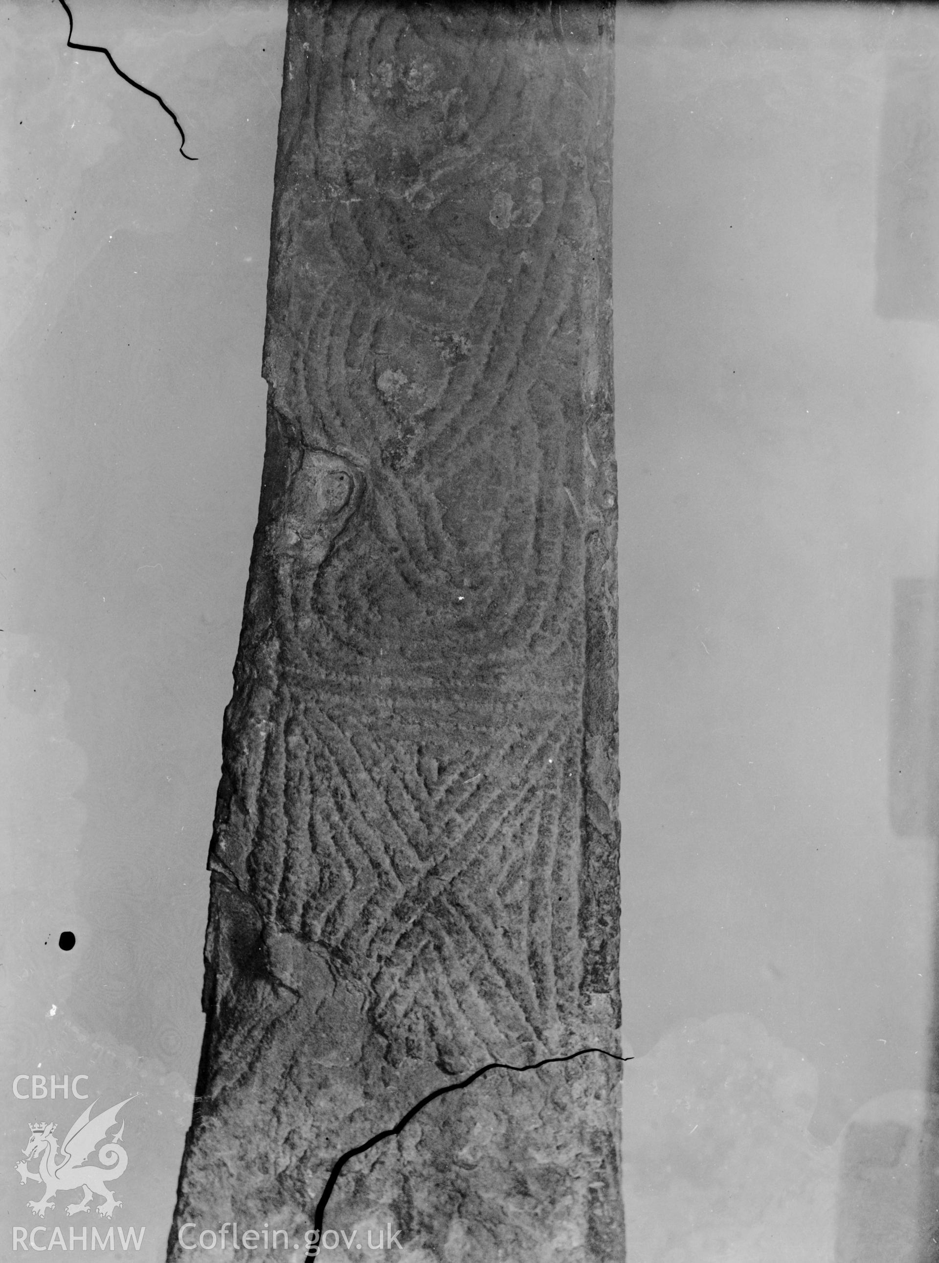 Black and white photo showing inscribed ston at Diserth.