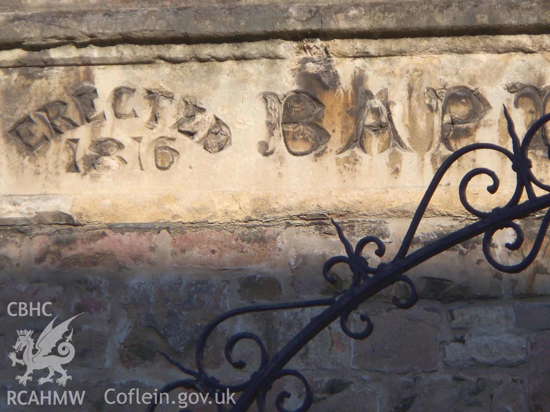 Plaque recording first building on site 'Erected 1816' on the NW front.