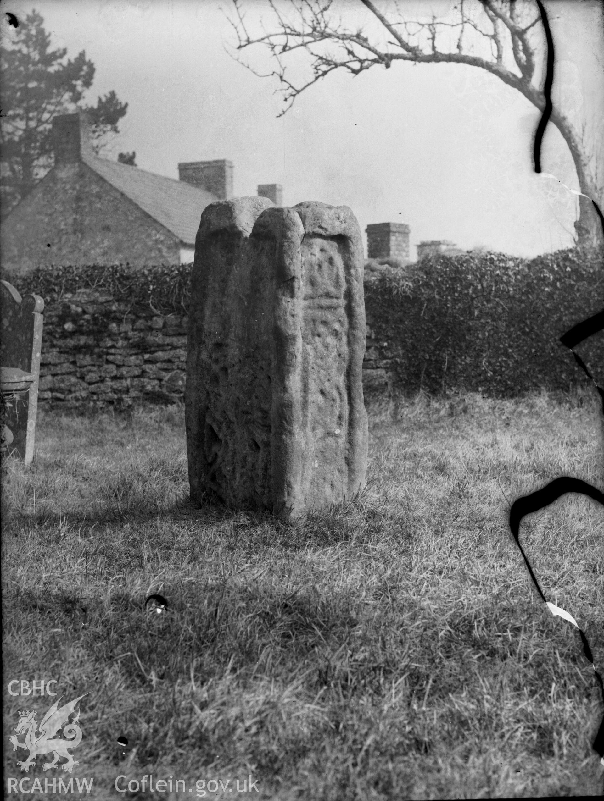 Black and white photo showing inscribed stone at Coychurch.