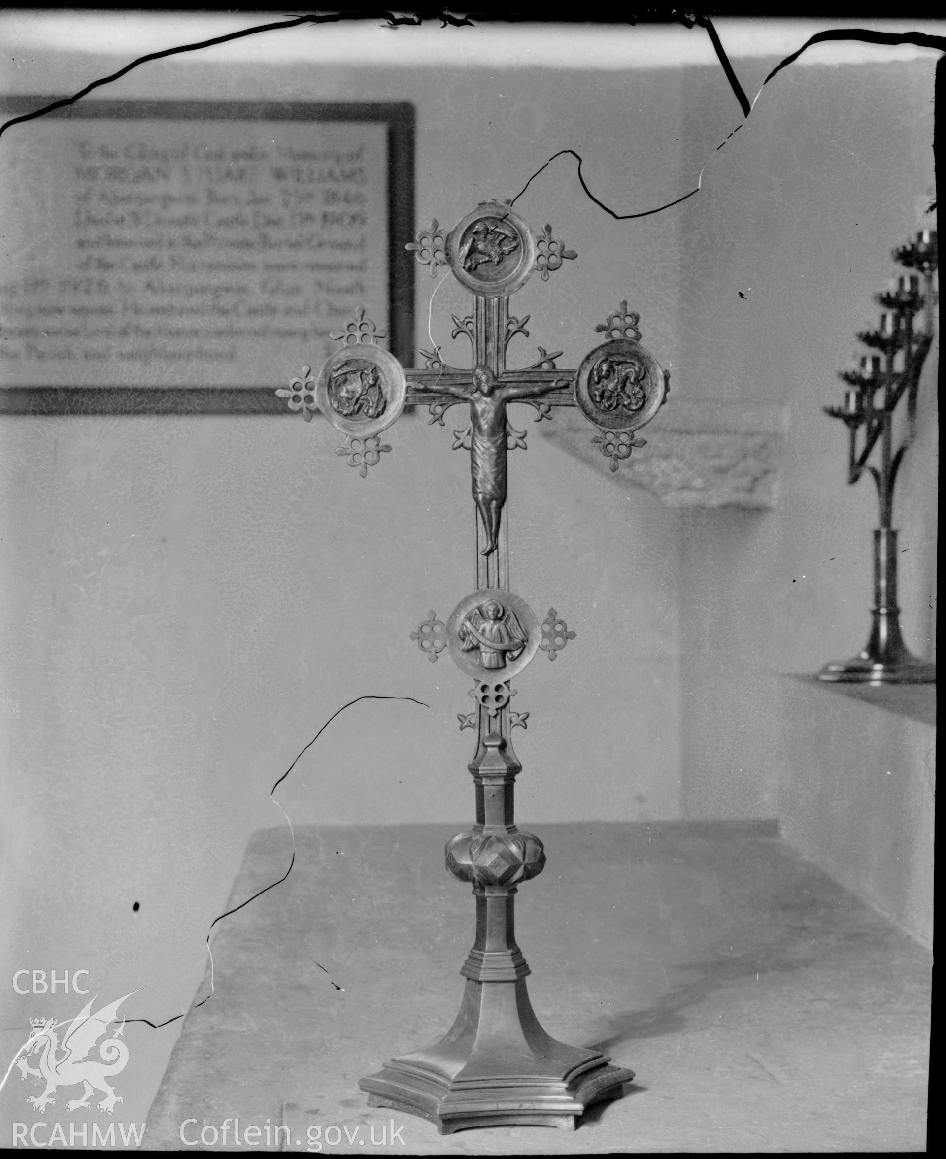 Black and white photo showing the altar cross at St Donat's Church.