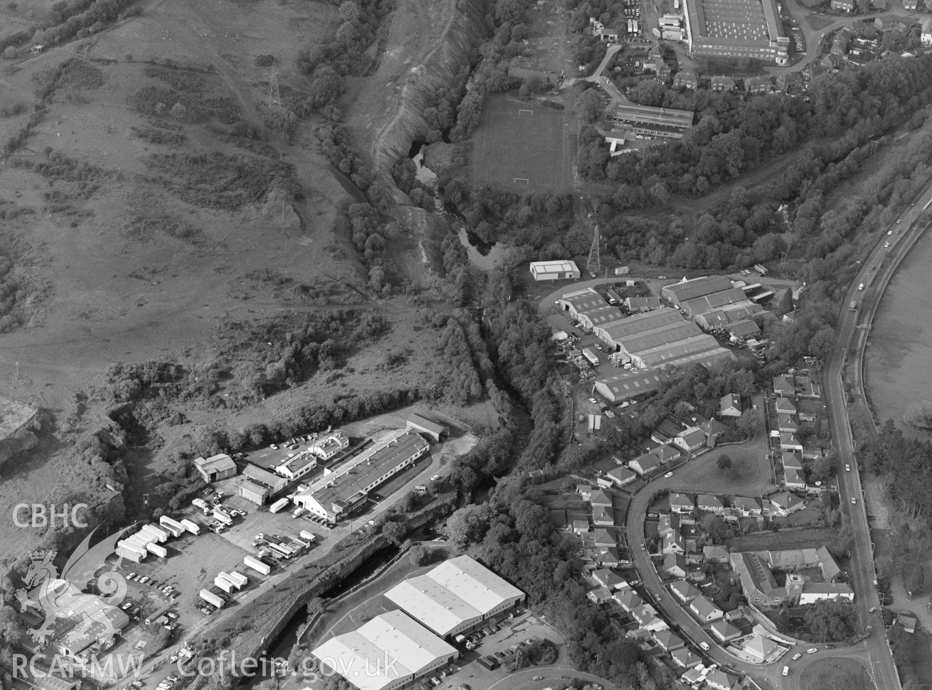 RCAHMW Black and white oblique aerial photograph of Cyfarthfa Ironworks, Merthyr Tydfil, taken on 19/10/1992 by CR Musson