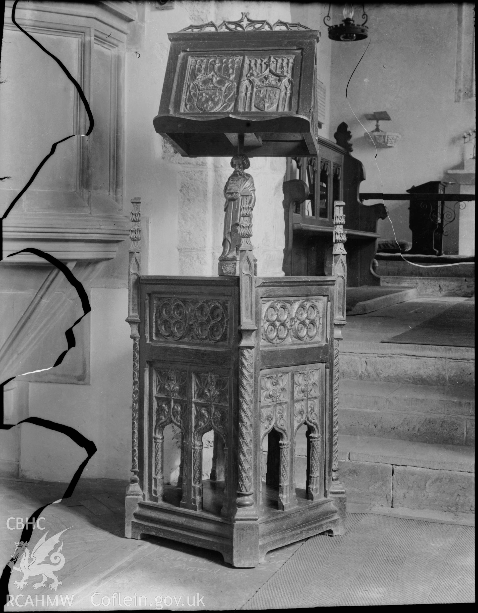 Black and white photo showing lectern at St Donat's Church.