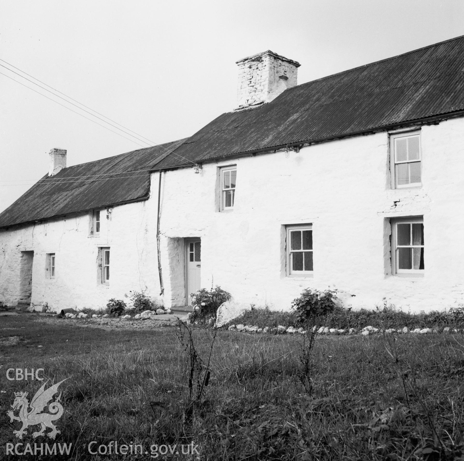 A black and white print of Gwastad house. Also included is a short handwritten description.