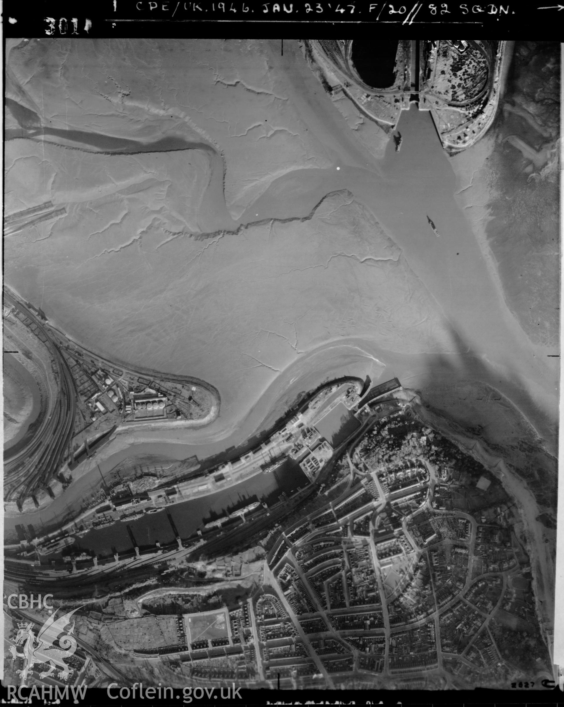 Black and white vertical aerial photograph taken by the RAF on 23/01/1947 centred on ST18677291 at a scale of 1:10000. The photograph includes part of Grangetown community in Cardiff.