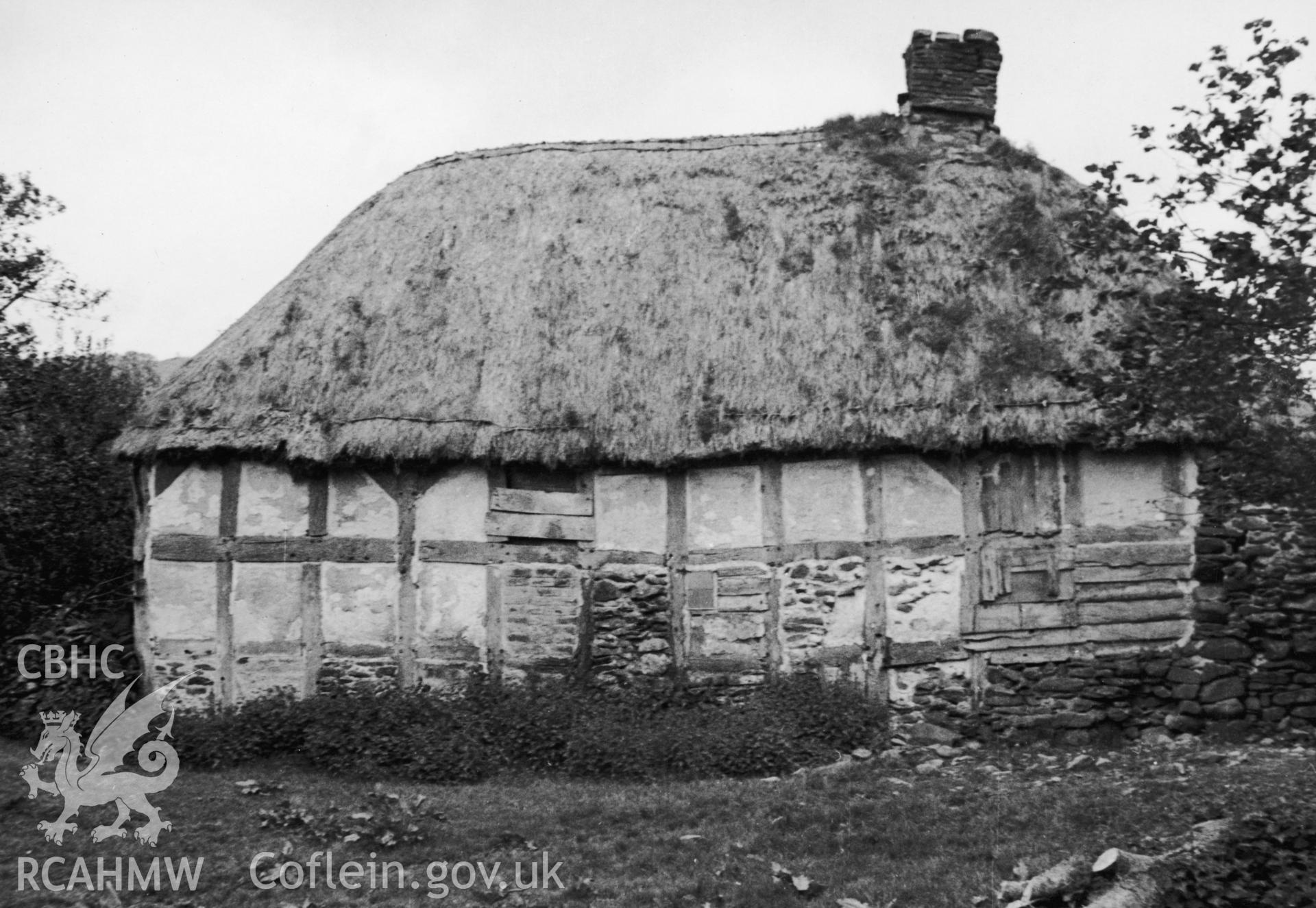 Exterior view of Abernodwydd Farmhouse taken by J.D.K. Lloyd, in 1938.