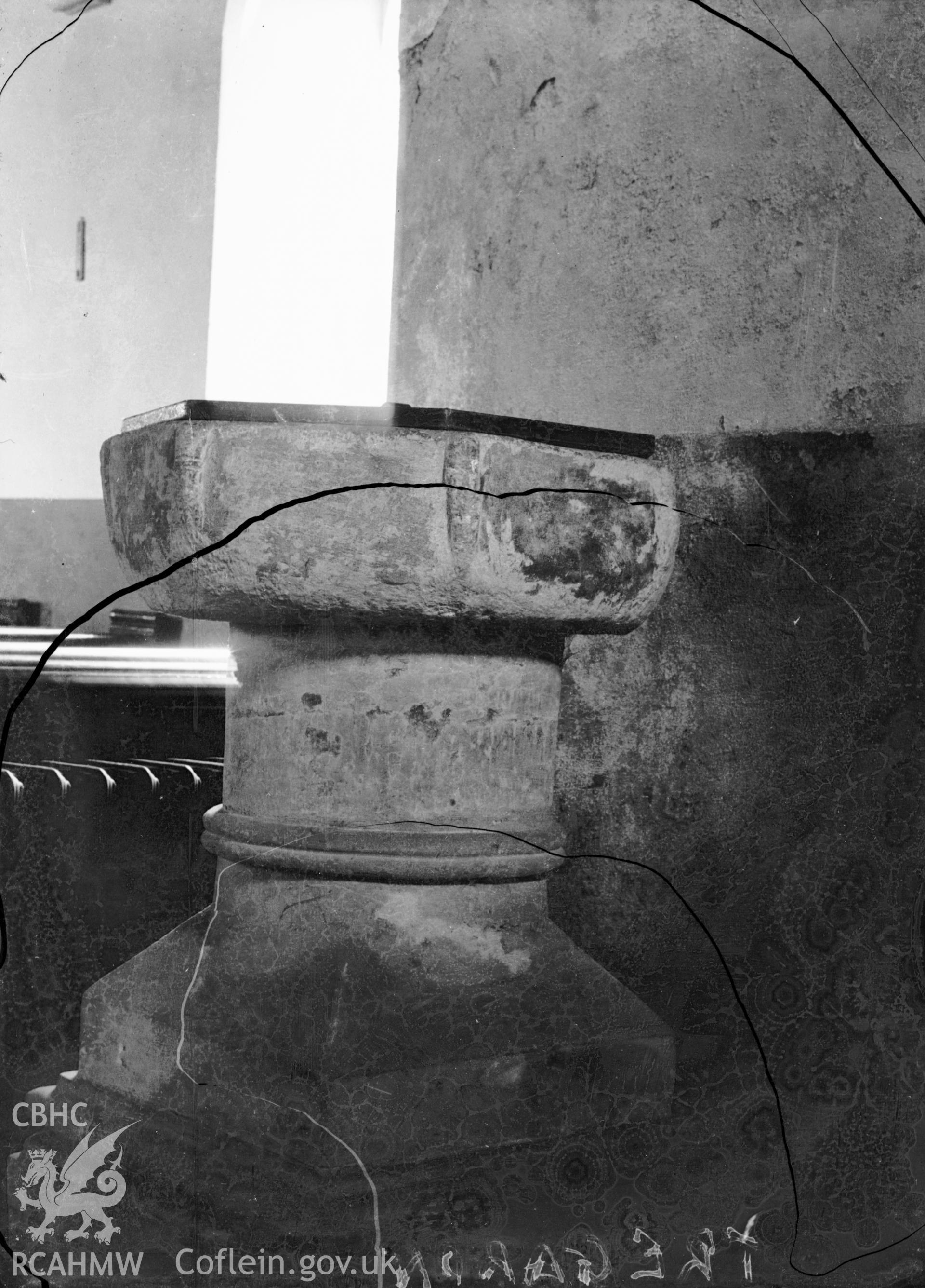 Black and white photo showing the font at Tregaron Church.