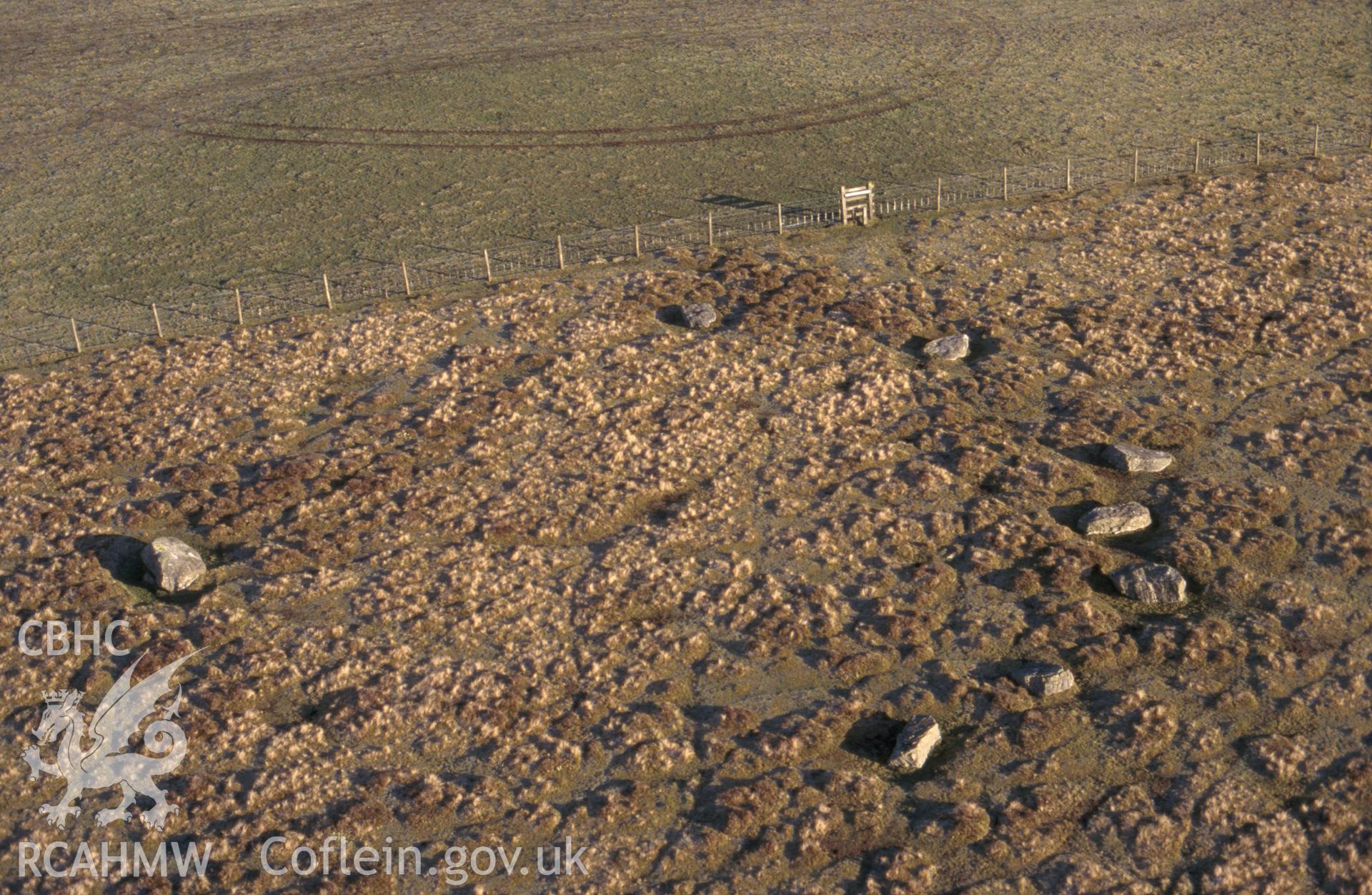 RCAHMW colour slide oblique aerial photograph of Cerrig Gaerau Stone Circle, Llanbrynmair, taken on 20/12/1998 by CR Musson