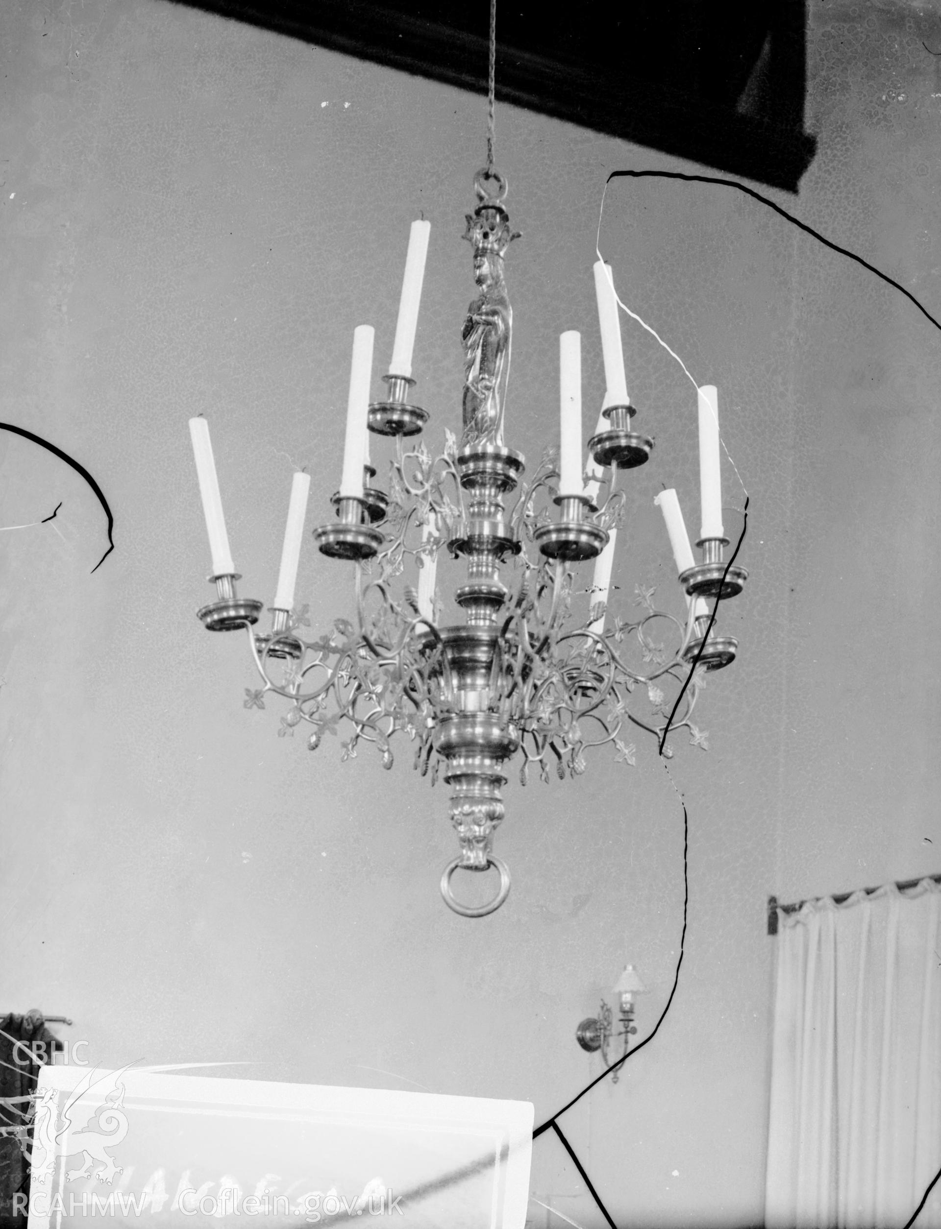 Black and white photo showing candelabra at Llandegla Church.