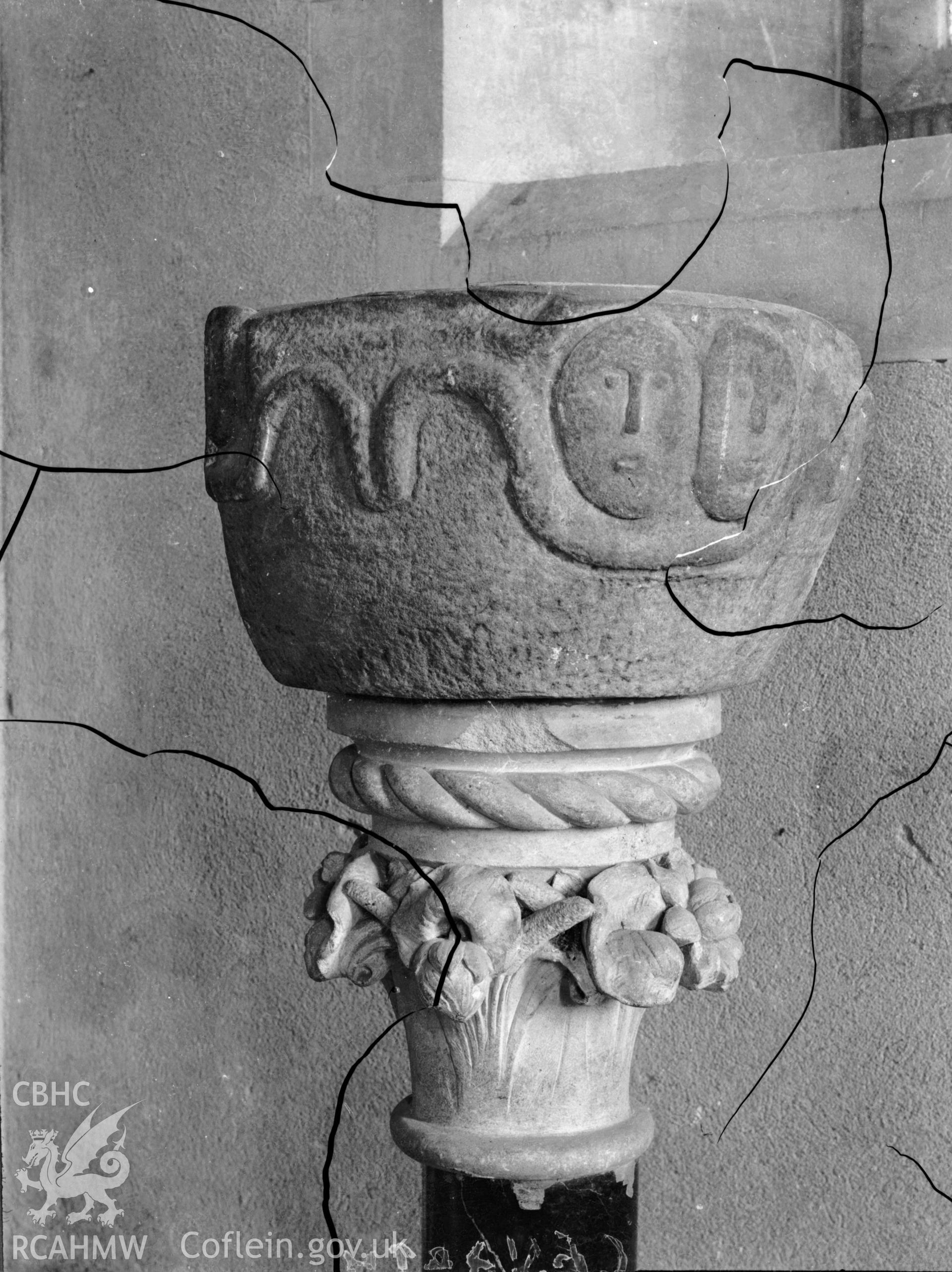 Black and white photo showing the font at Cenarth Church.