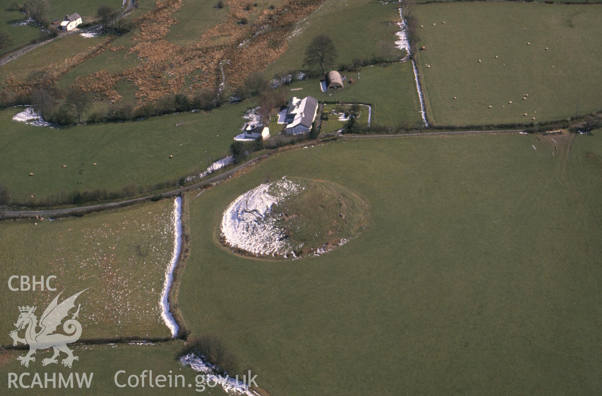 Slide of RCAHMW colour oblique aerial photograph of Ty'n y Celyn Motte, taken by C.R. Musson, 1990.