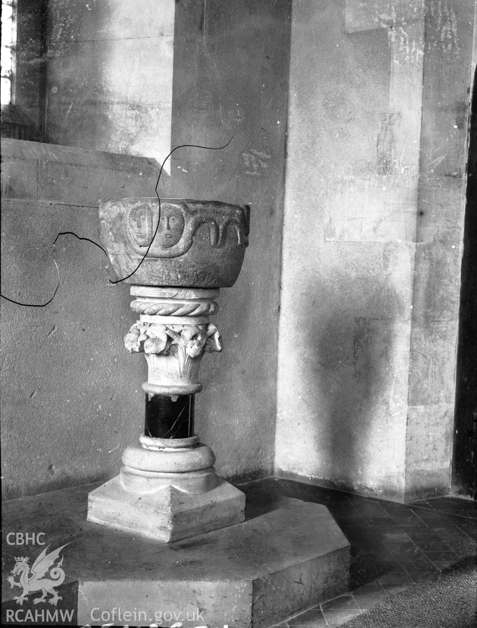 Black and white photo showing the font at Cenarth Church.