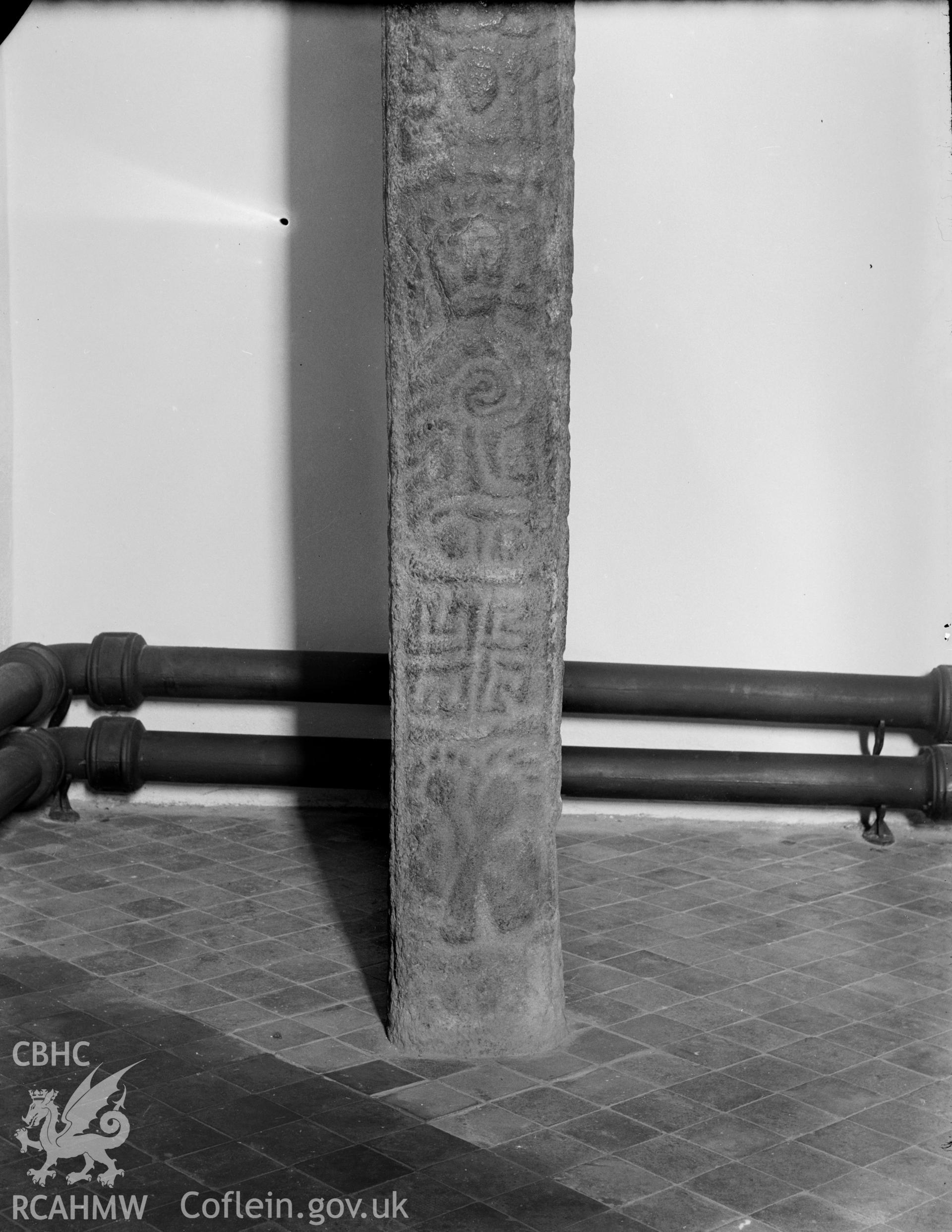 Black and white photo showing inscribed stone at Llanbadarn Fawr Church.