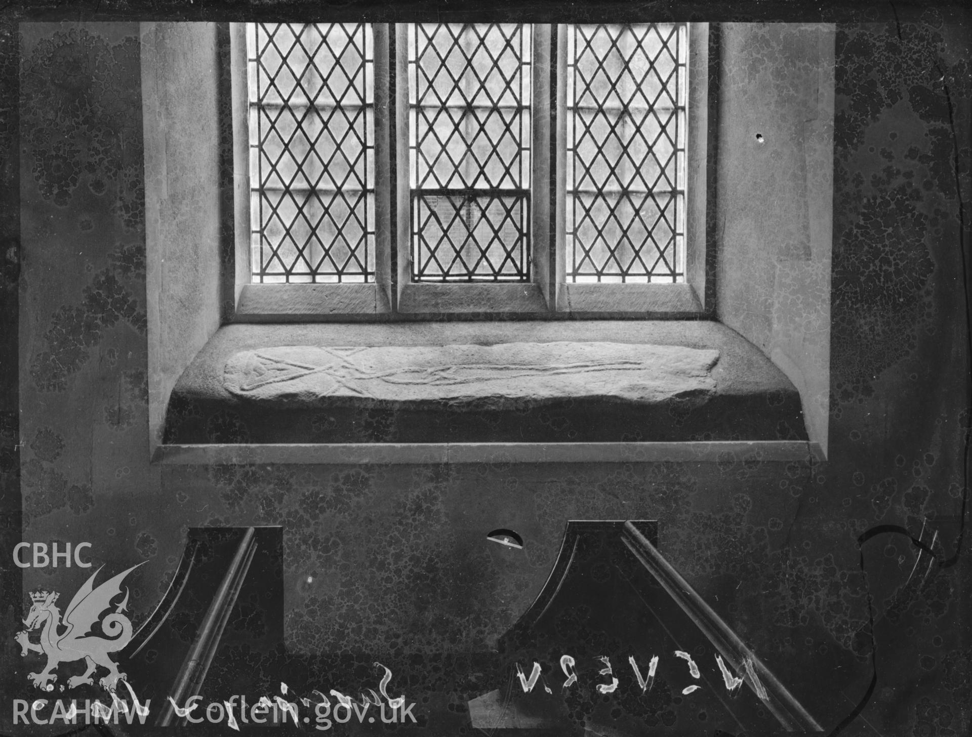 Black and white photo showing inscribed cross on the window ledge at St Brynach's Church, Nevern.