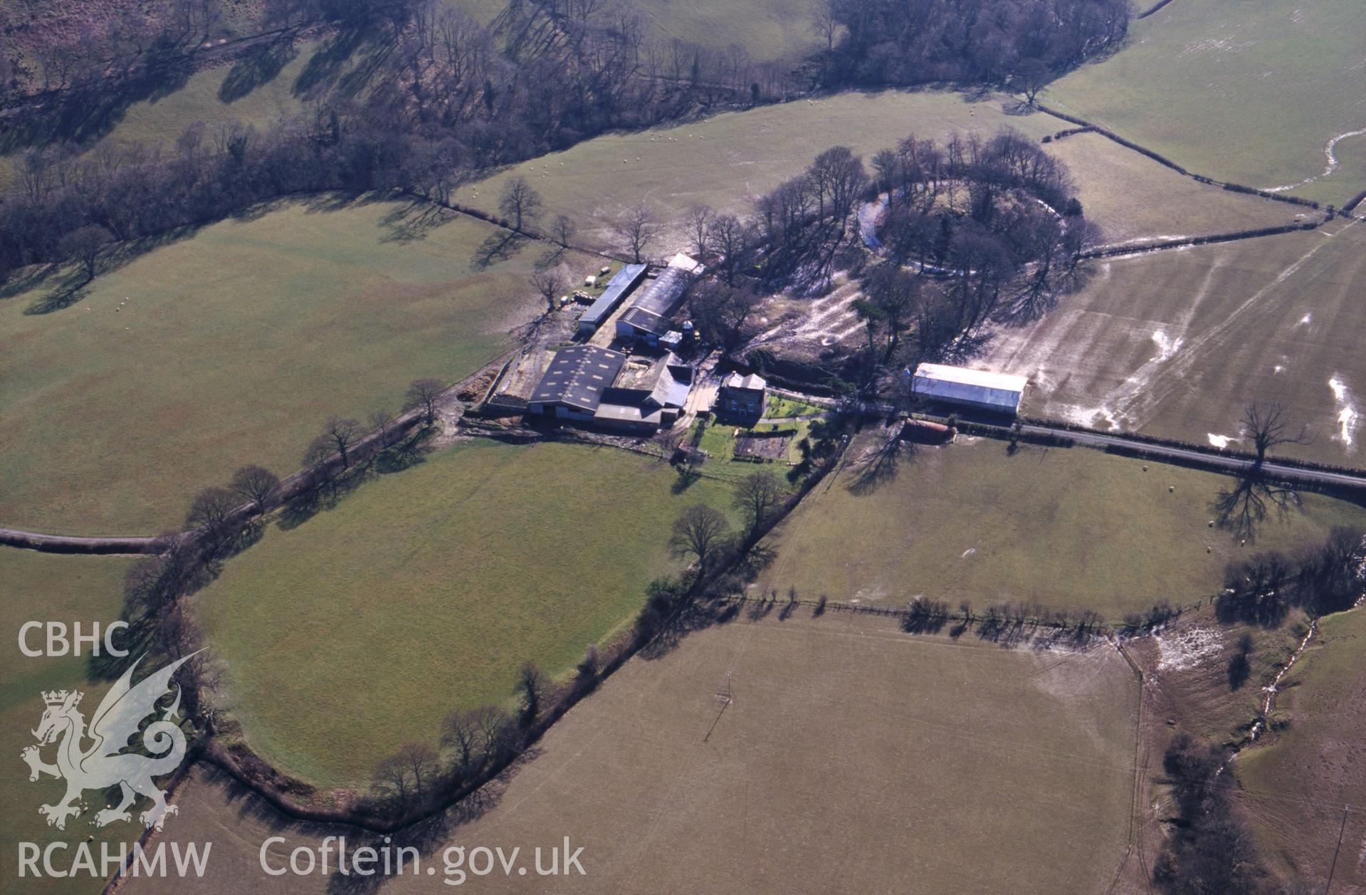 RCAHMW colour slide aerial photograph of Motte and Bailey W of Allt y Gaer. Taken by C R Musson on 21/03/1995