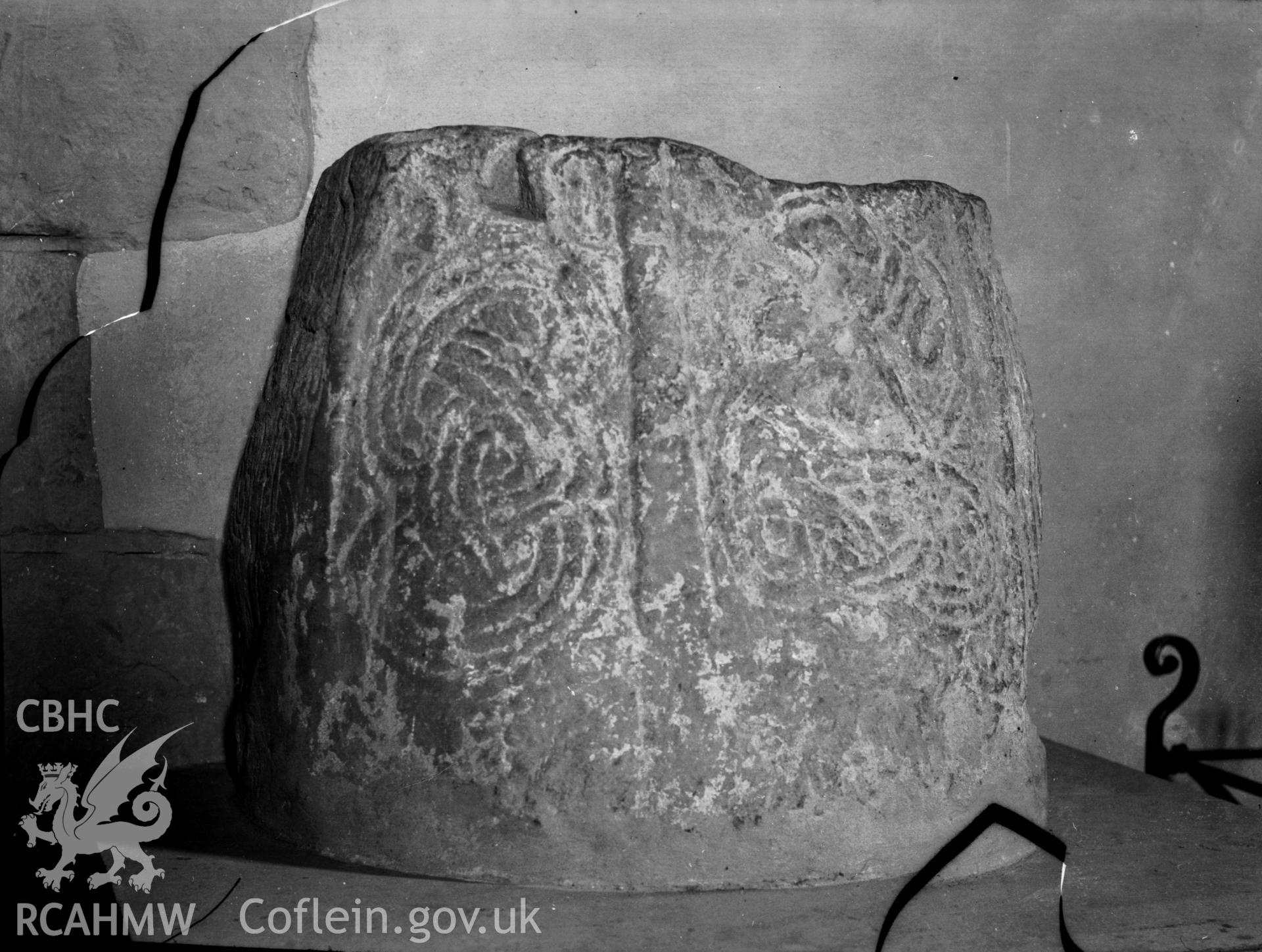 Black and white photo showing inscribed stone at Diserth Church.