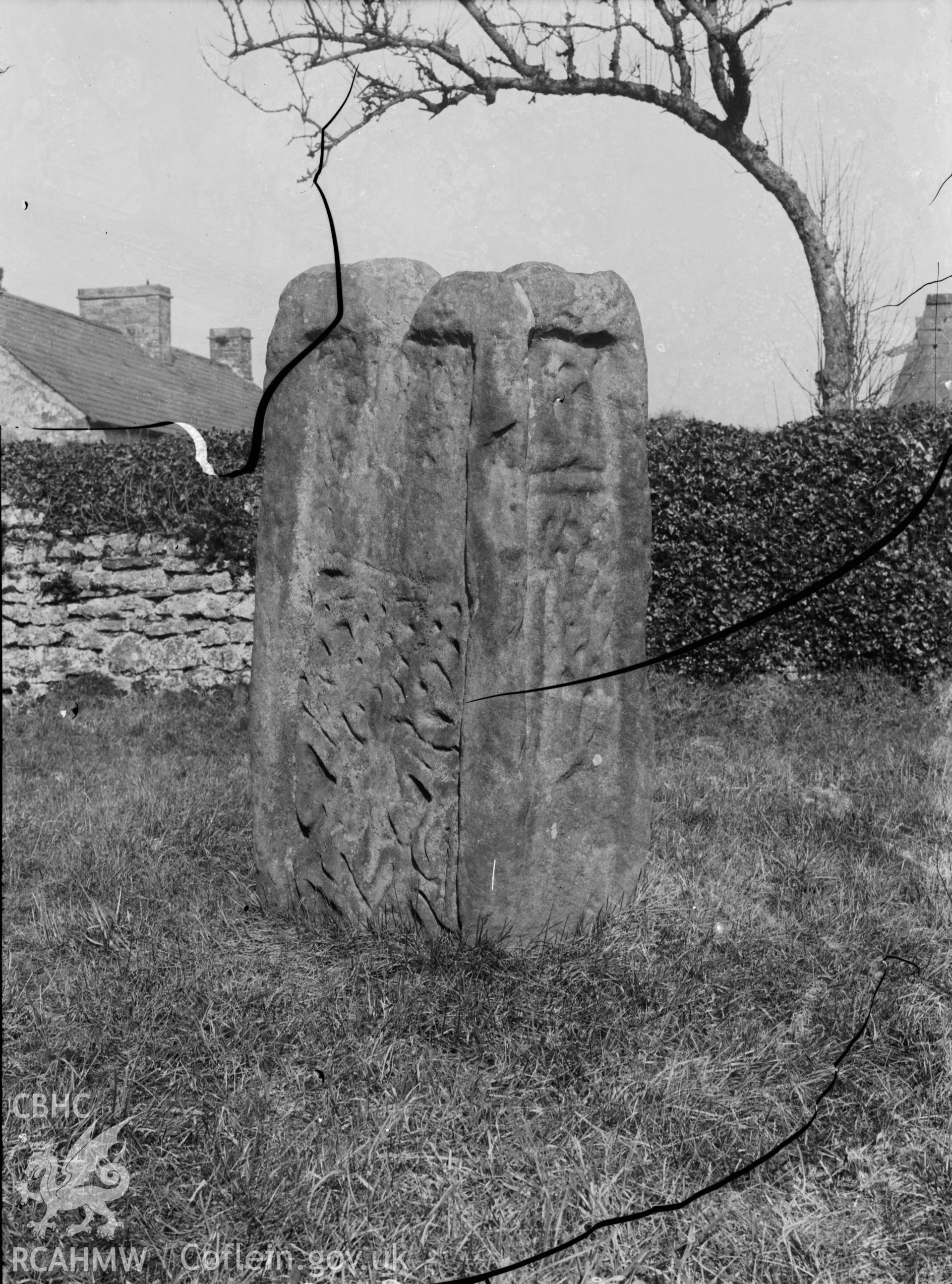 Black and white photo showing inscribed stone at Coychurch.