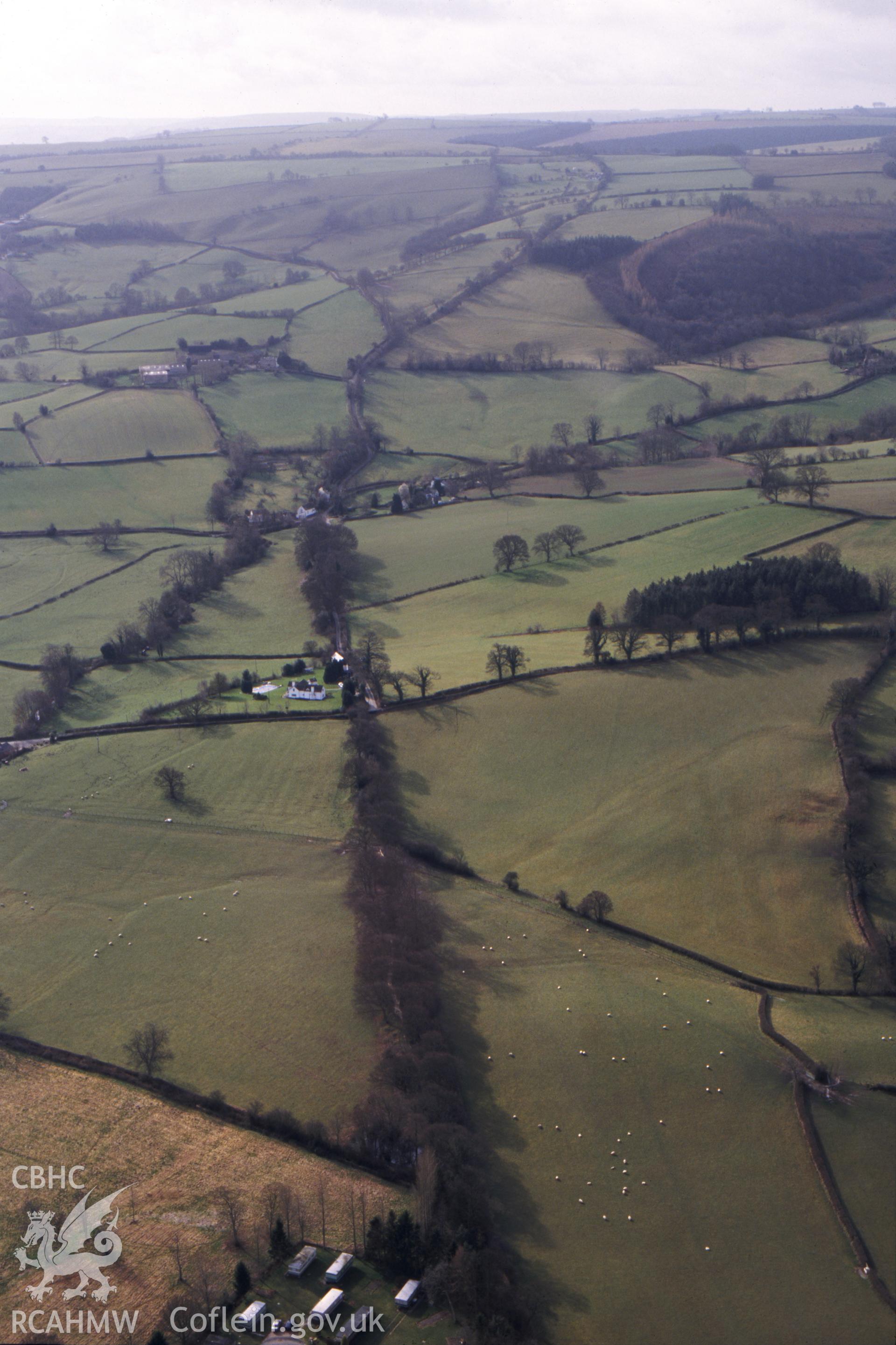 RCAHMW colour slide oblique aerial photograph of the Cwm Section offa's Dyke, Churchstoke, taken on 14/03/1999 by CR Musson