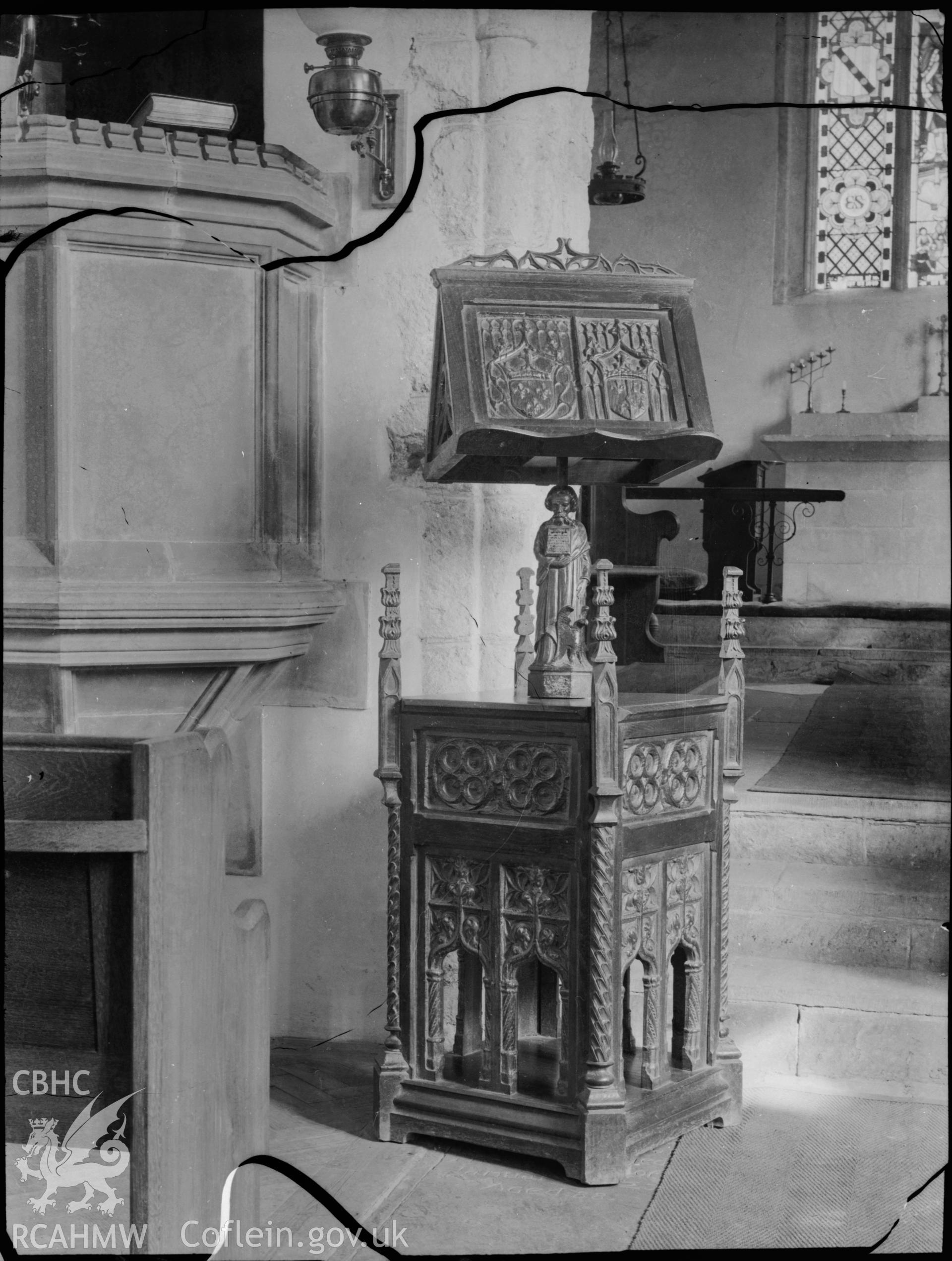 Black and white photo showing lectern at St Donat's Church.