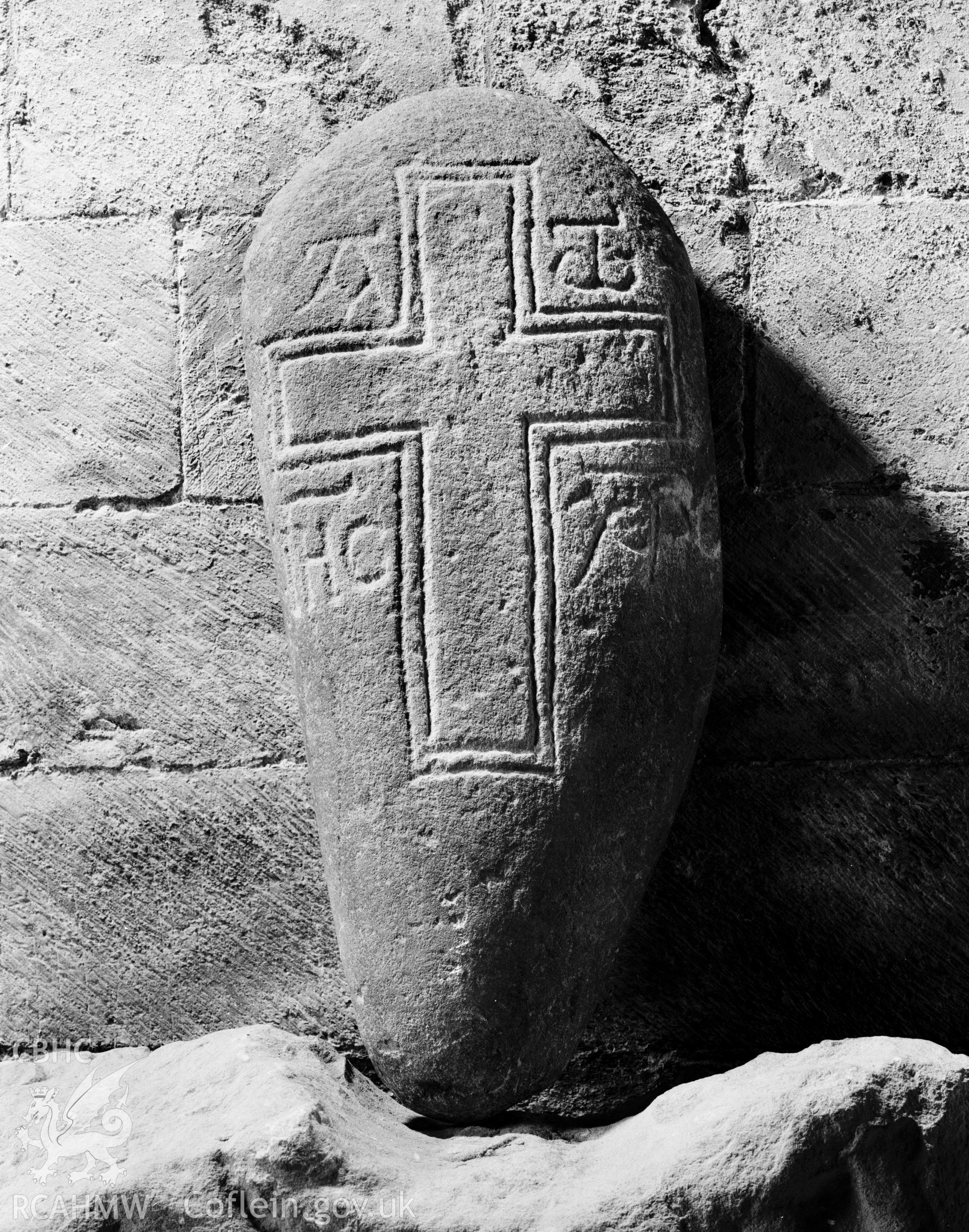 Cross-carved stone in Porth y Twr, St David's Cathedral taken by RCAHMW circa 1987.