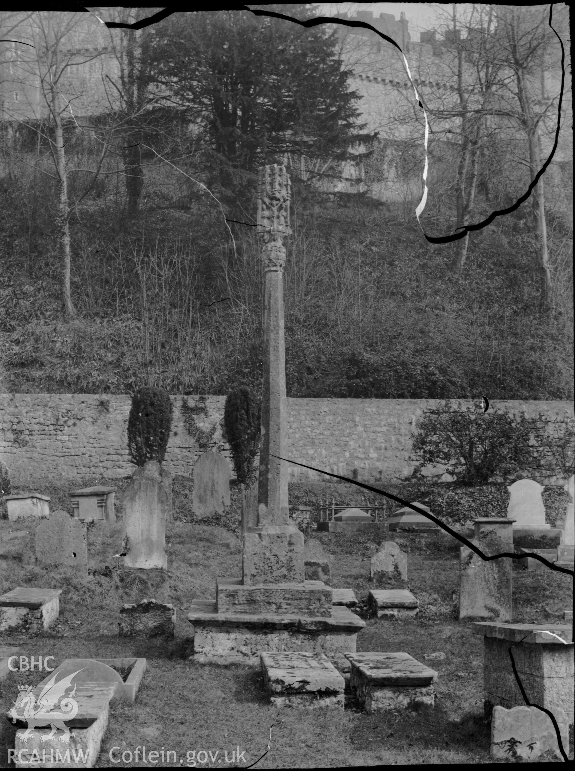 Black and white photo showing St Donat's Churchyard Cross.