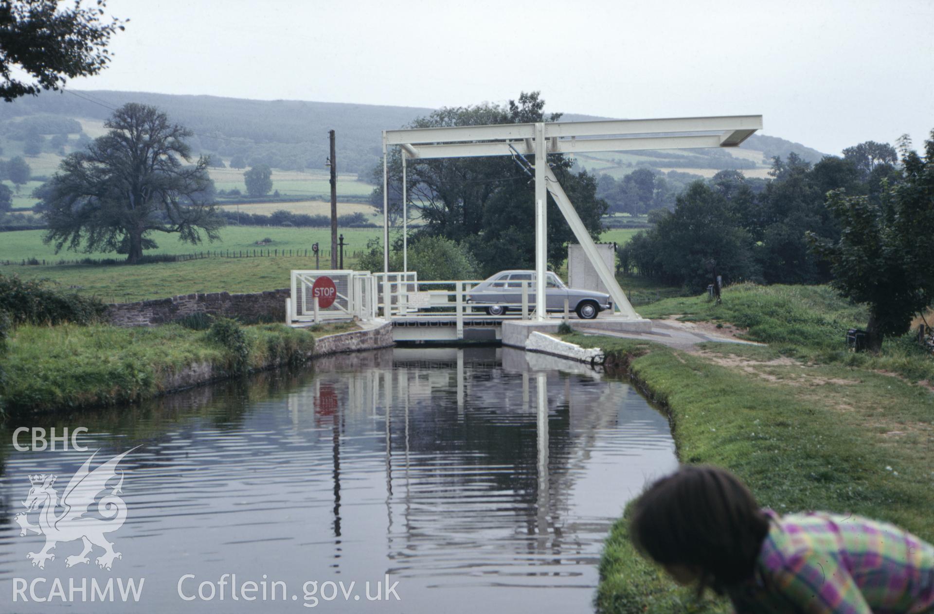 Colour photographic transparency showing electric lift bridge on the Brecon and Monmouth canal; collated by the former Central Office of Information.