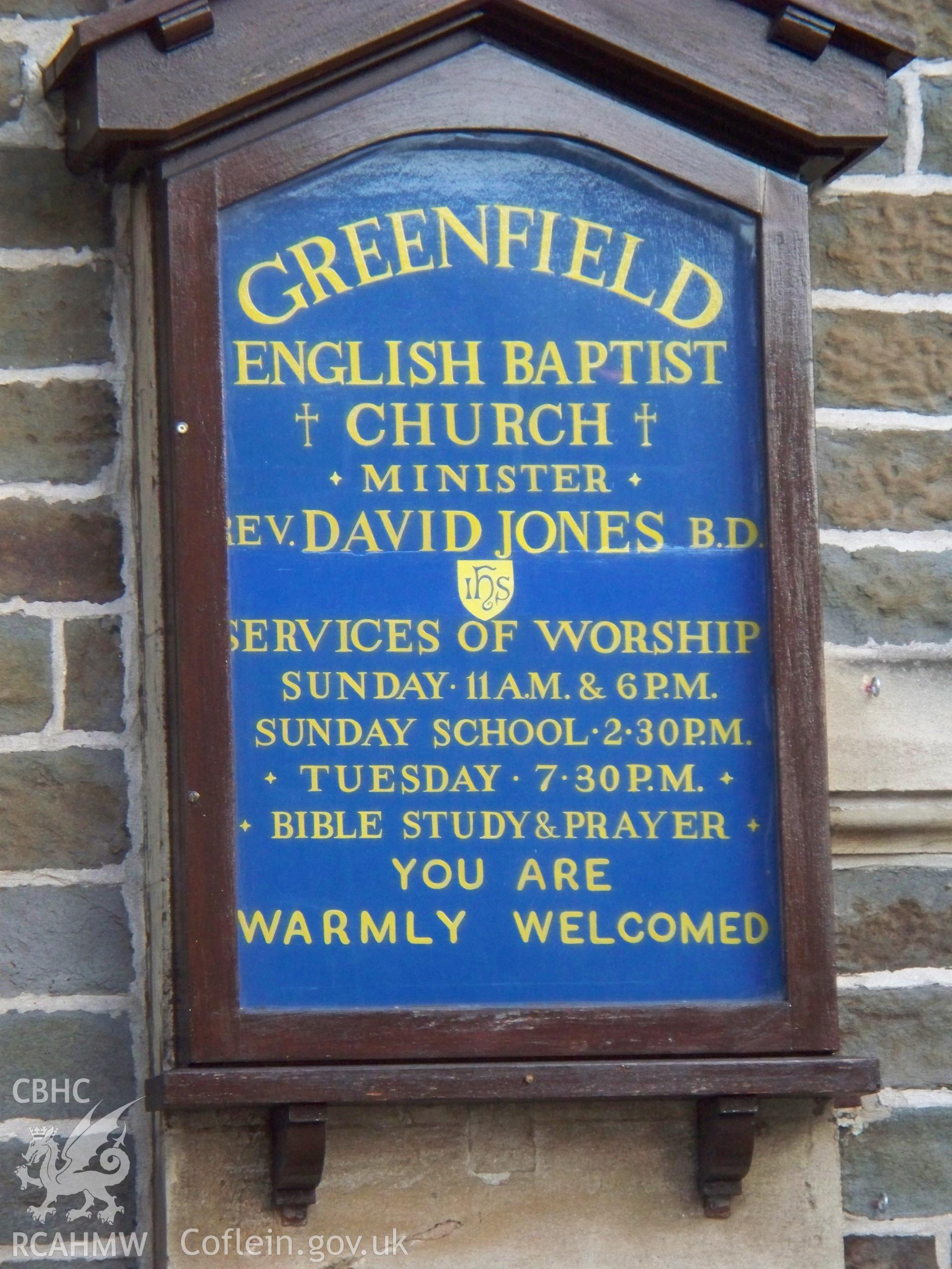 Order of service board on main NW front.