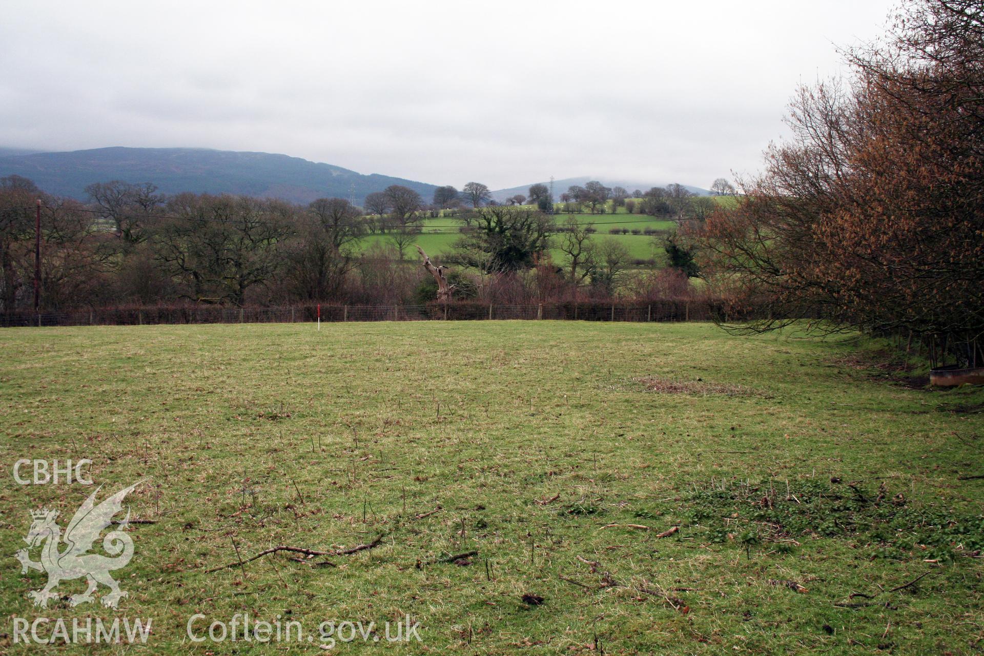 View of plough-levelled barrows (site of) from north-west, 1m scale