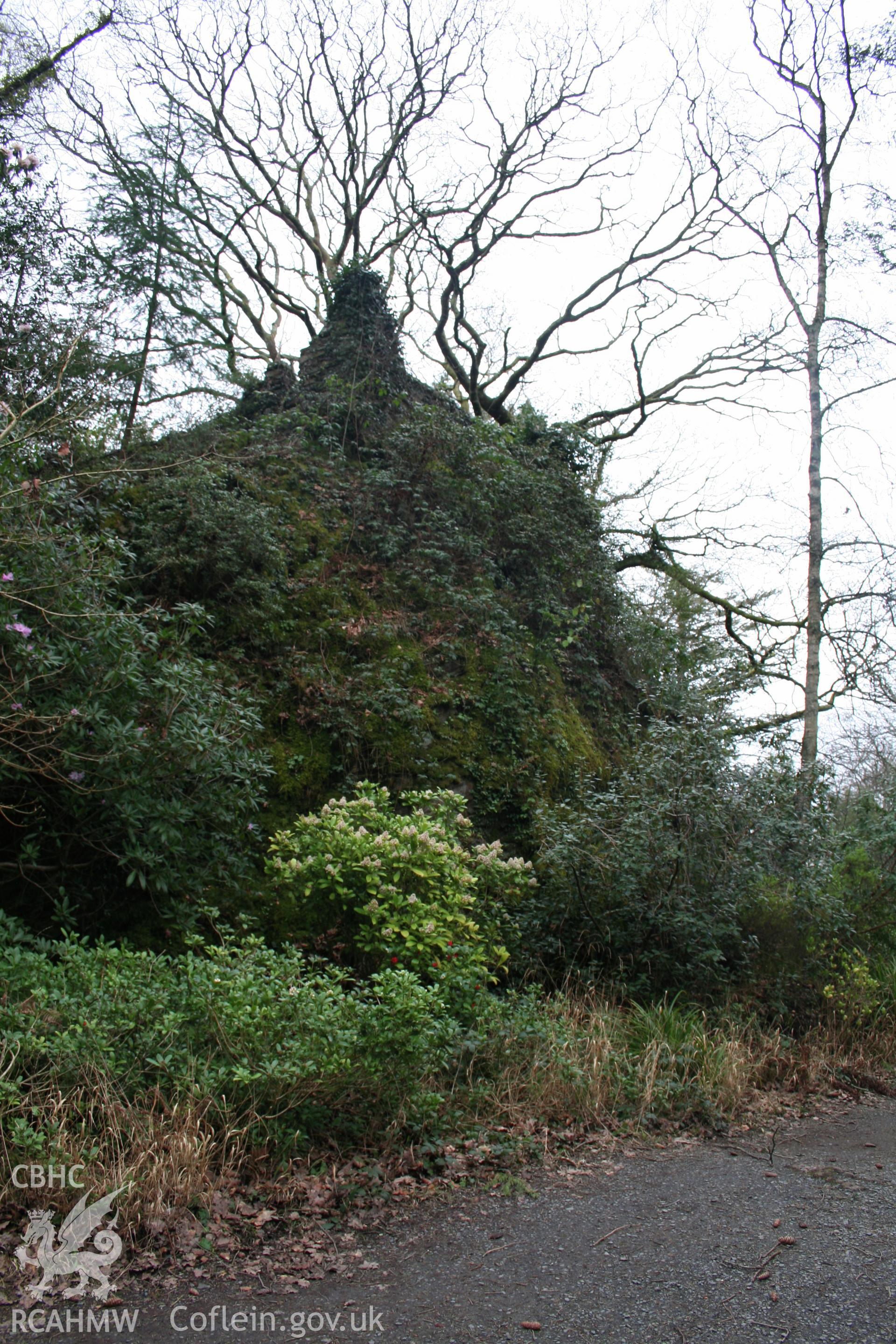 Castell Aber Ia from the south-west showing the rock outcrop upon which the castle once stood.  The battlemented wall on top of the outcrop was constructed in the 1960s by Clough Williams-Ellis.