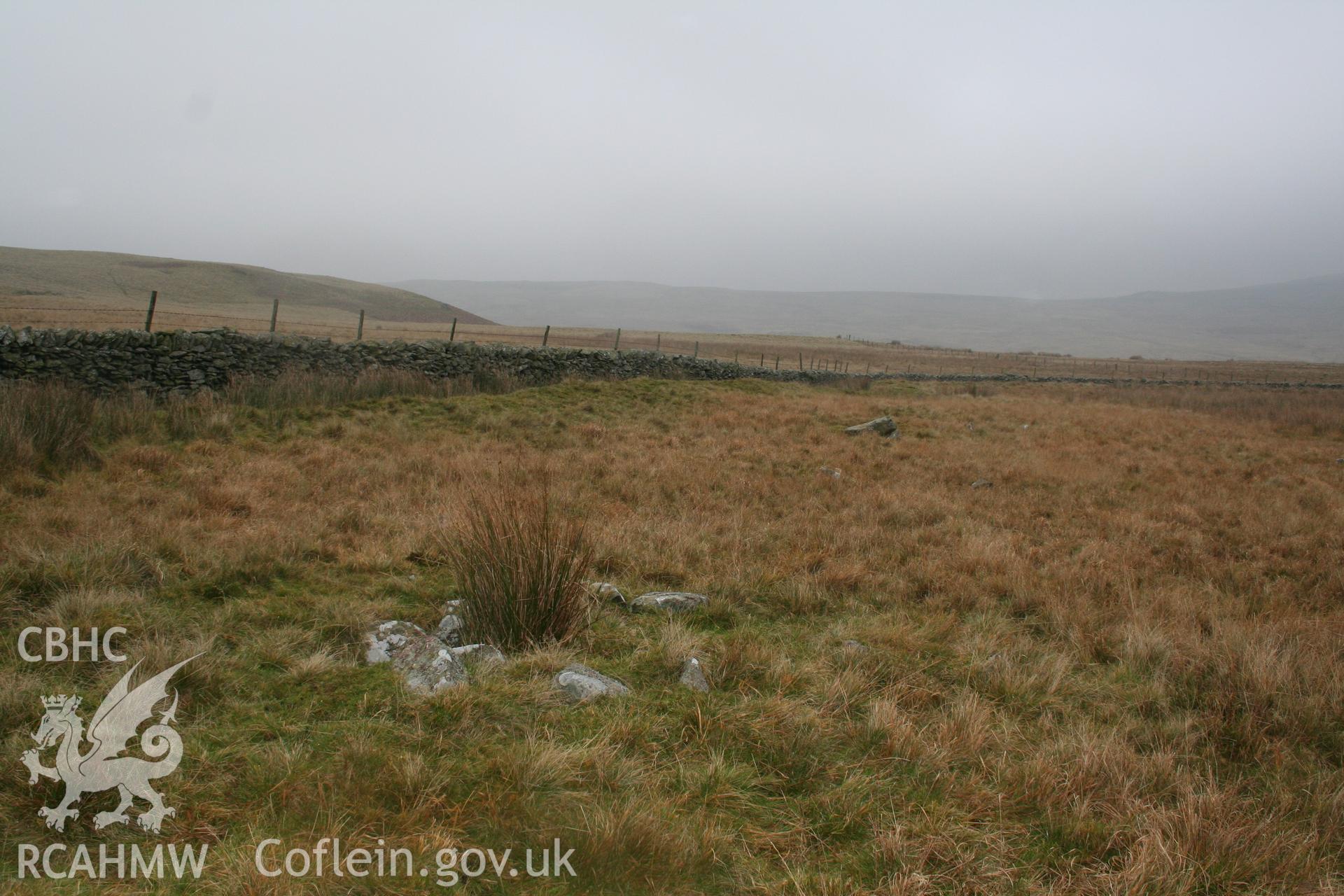 Cairn and stones viewed from the south-west.