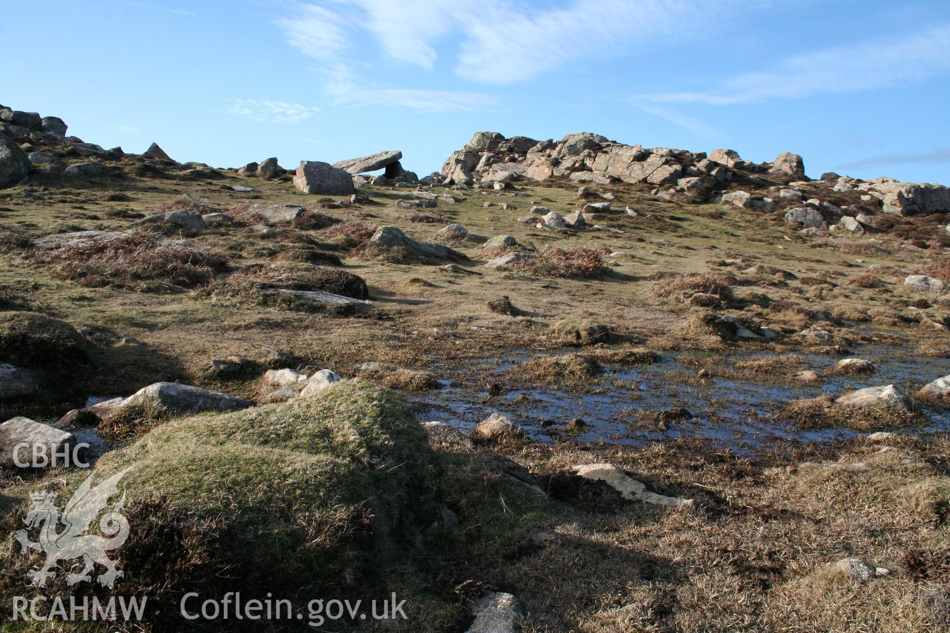 View of chamber from south-east with outcrops