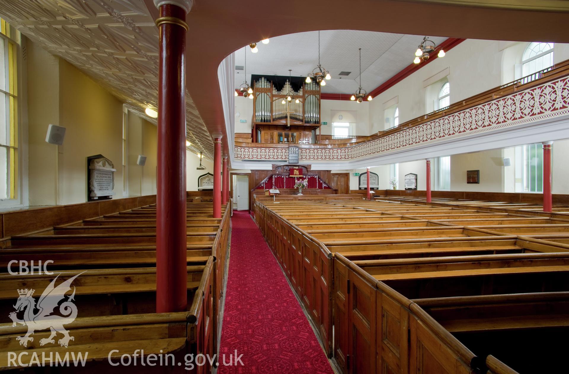 Interior from ground floor below gallery looking southeast.