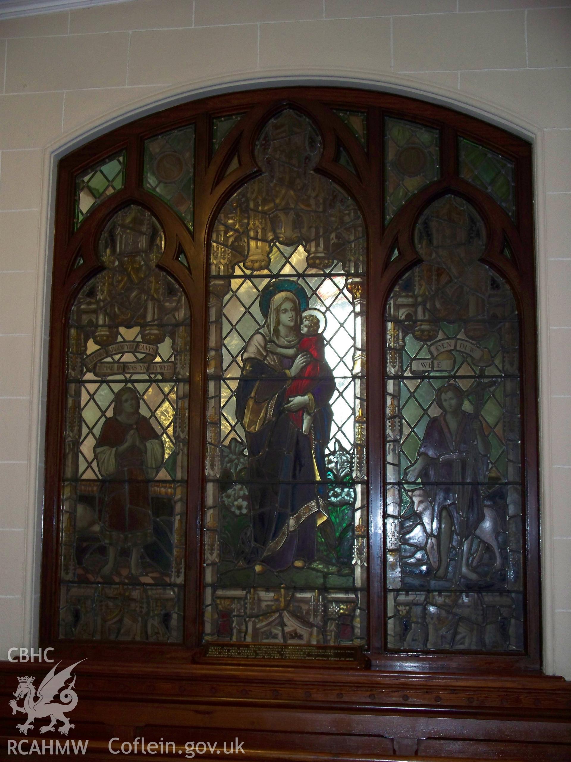 Stained glass in the west side of the organ apse with harp.