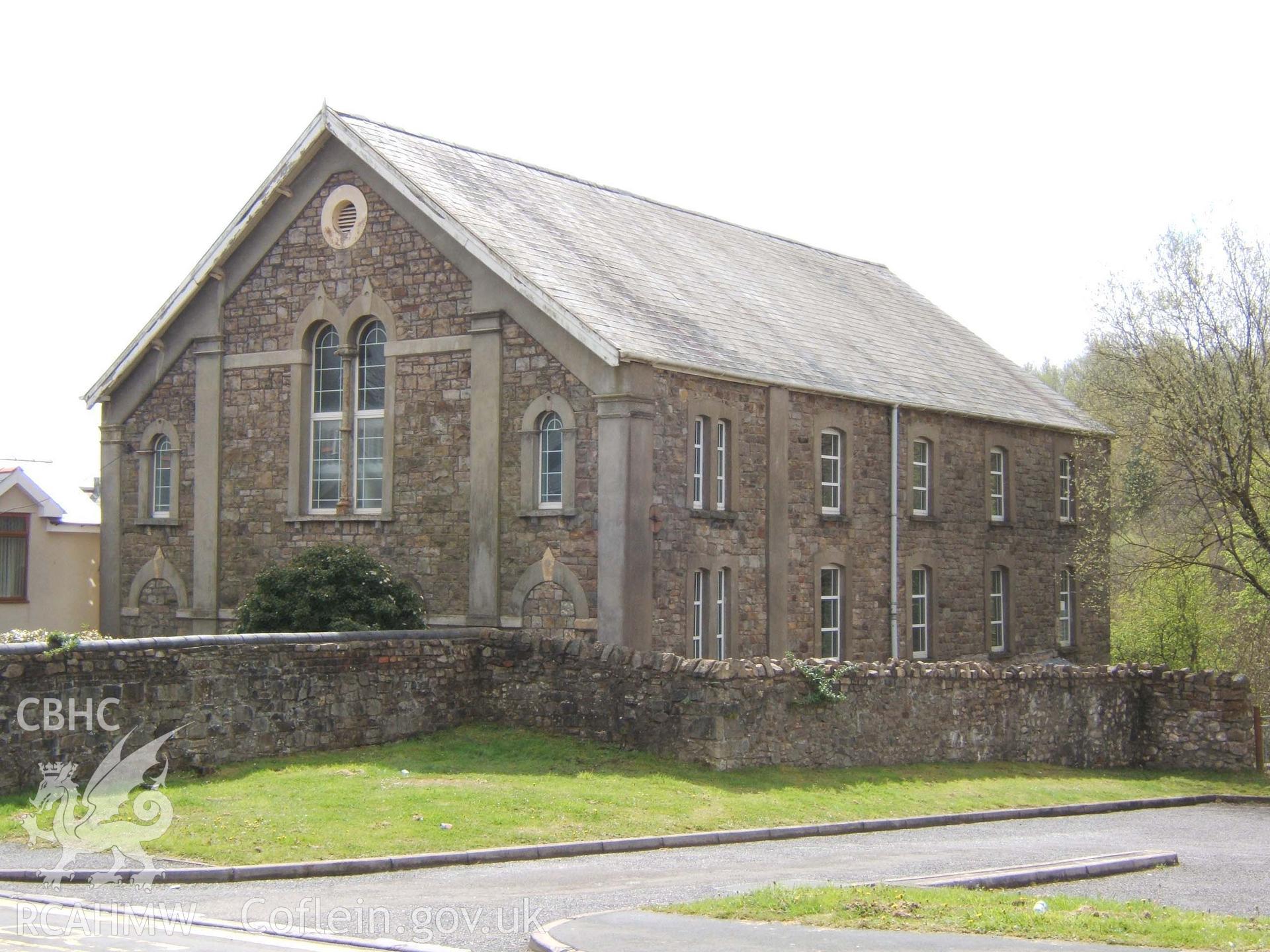 North gable-end entrance and west side.