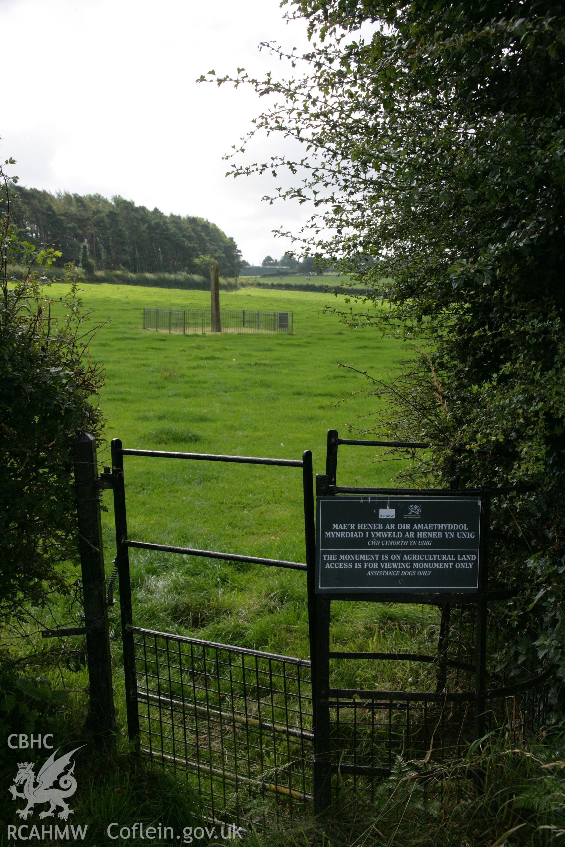 Maen Achwyfan Cross, approach from north through gate.