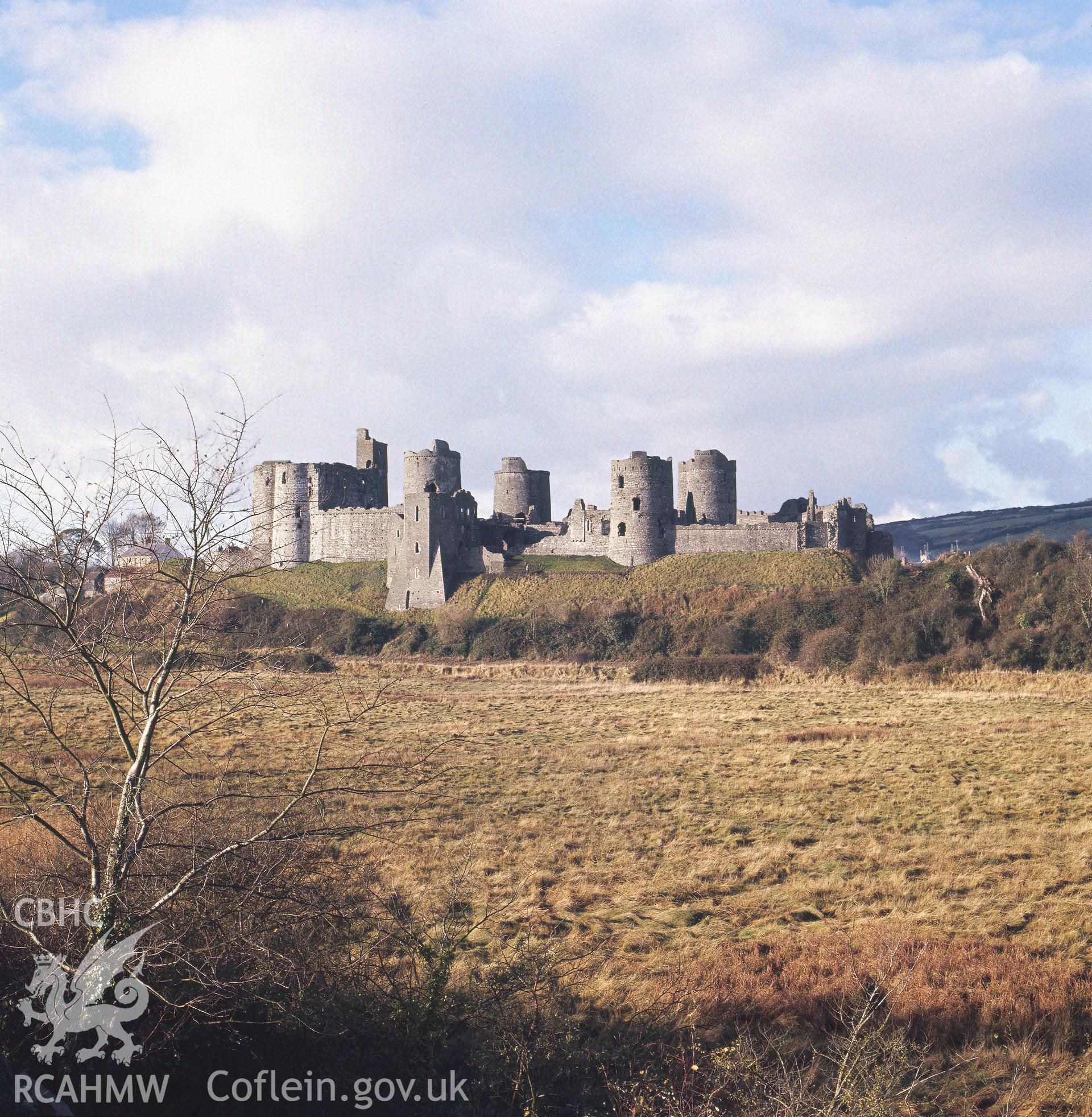 1 colour transparency showing view of Kidwelly castle; collated by the former Central Office of Information.