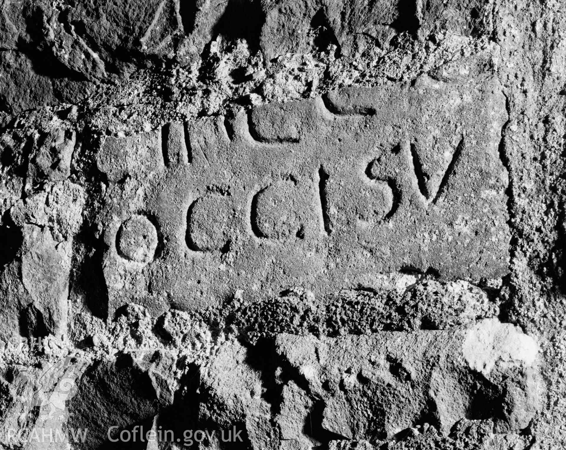 Black and white photograph of fragmentary roman-letter inscribed stone, St. David's Church, Llanddewi Brefi: Corpus of Early Medieval Inscribed Stones and Stone Sculpture in Wales, Volume II: South-West Wales', Figure CD9.2, p.151.