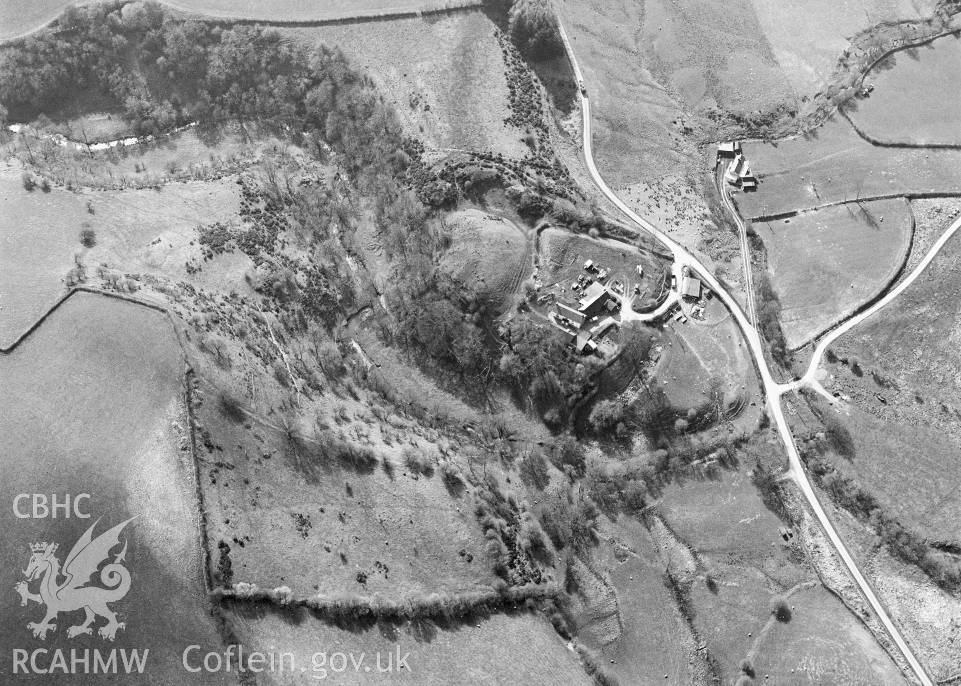 RCAHMW black and white aerial photograph of Motte and Bailey. Taken by C R Musson on 12/04/1995