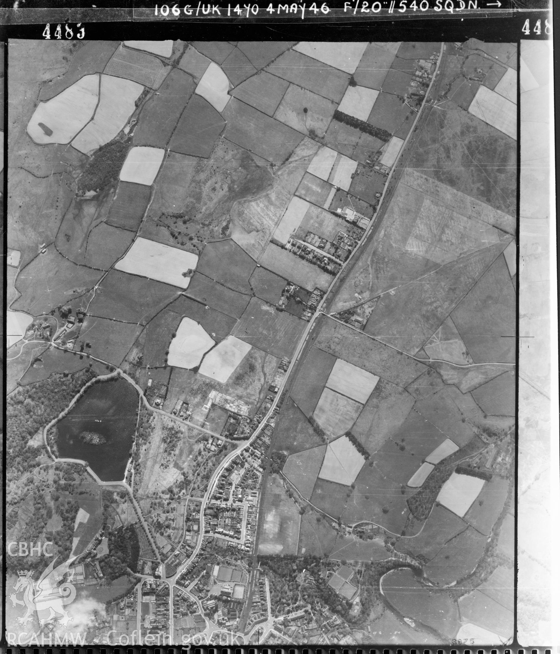 Black and white vertical aerial photograph taken by the RAF on 04/05/1946 centred on SO05796020 at a scale of 1:10000. The photograph includes part of Llandrindod Wells community in Powys.