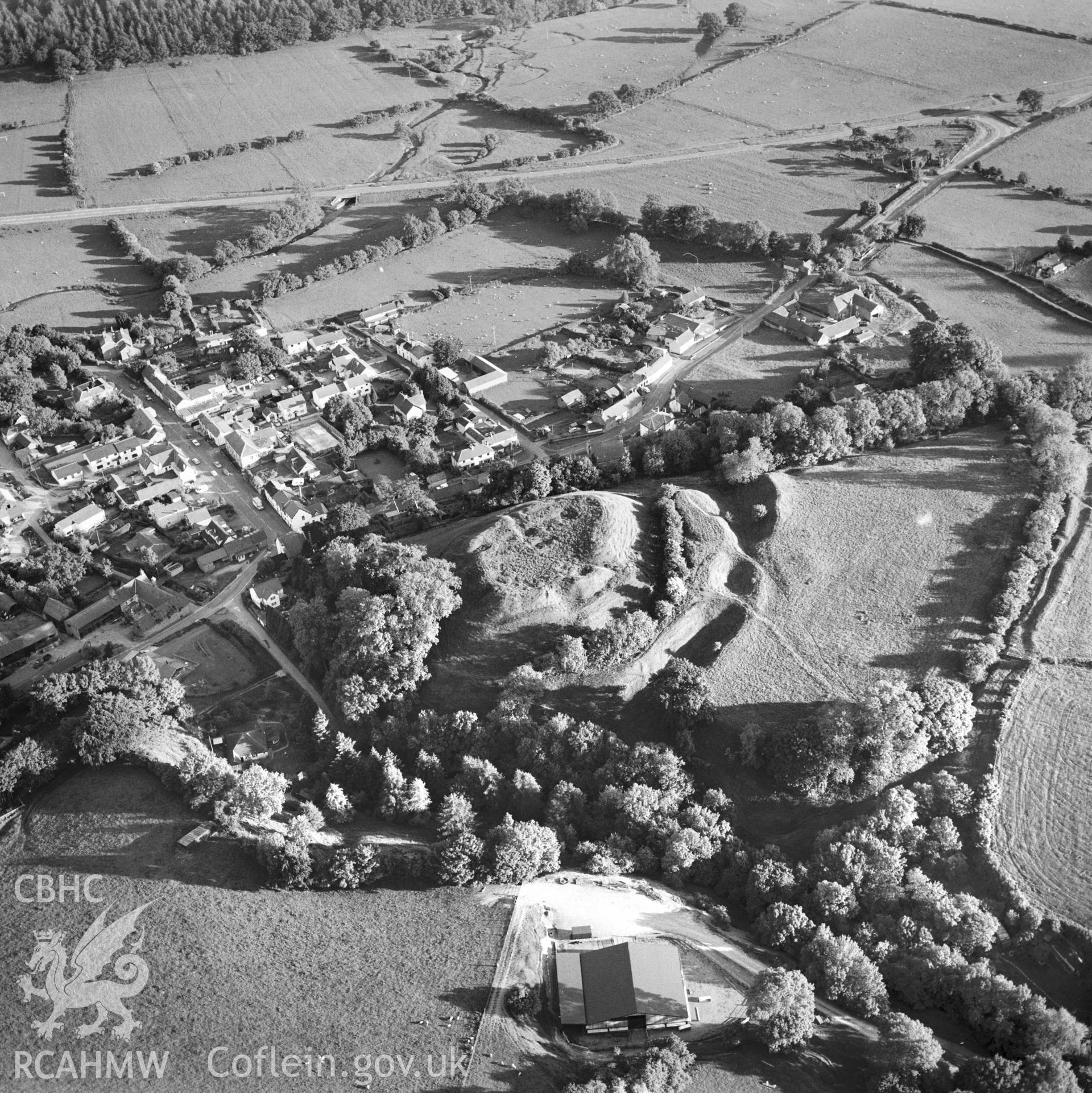 RCAHMW Black and white oblique aerial photograph of New Radnor Castle, taken by CR Musson on 13/06/88