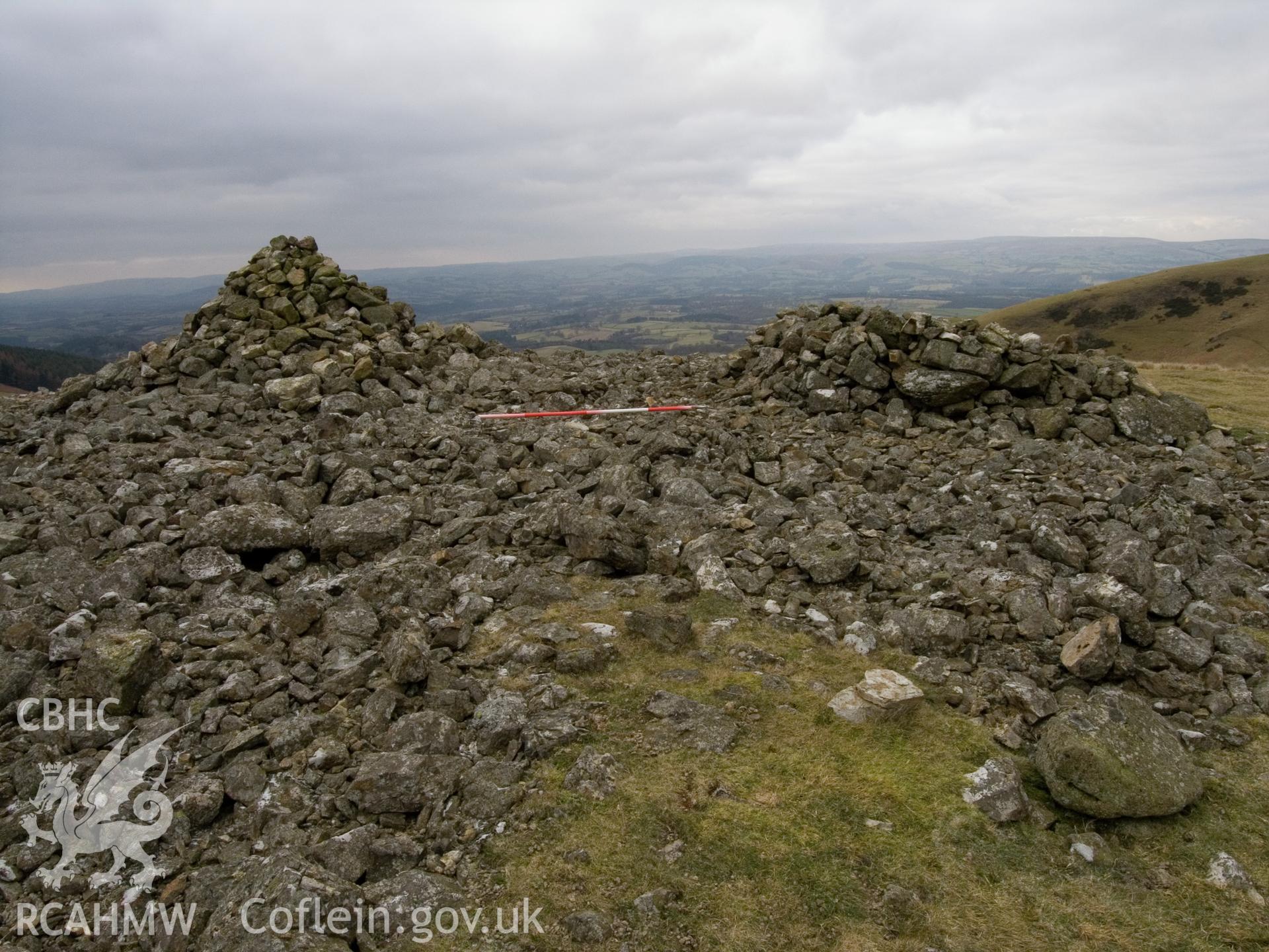 view looking W, with shelter (509837) and marker cairn (509838).