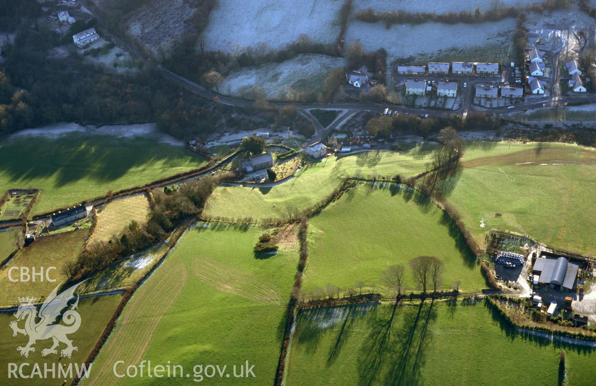 RCAHMW colour slide oblique aerial photograph of St Sulien's Church, Silian, Llangybi, taken on 11/01/1999 by Toby Driver