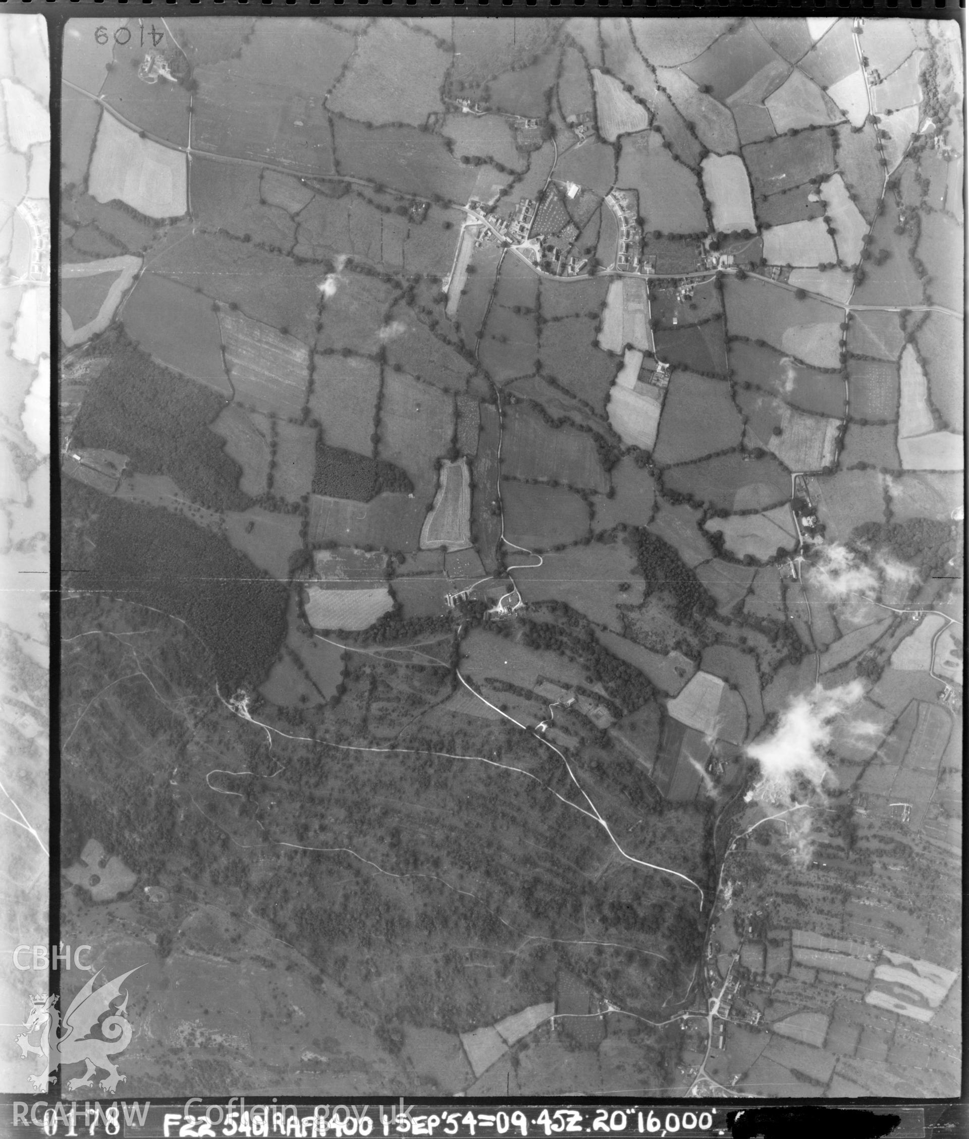 Black and white vertical aerial photograph, taken by the RAF, showing the Llanferres area. 1954.