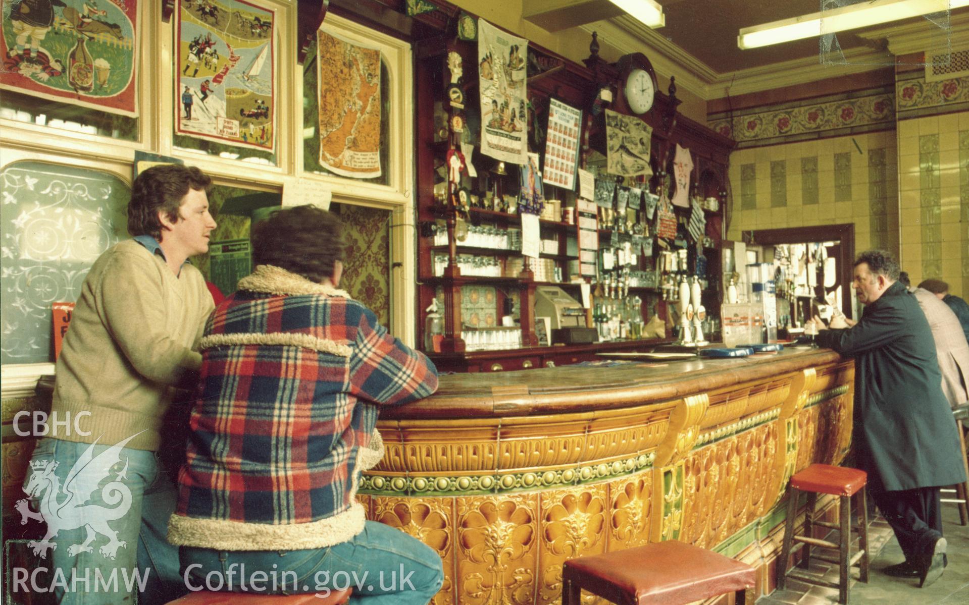 1 b/w print showing interior of the Golden Cross, Bute Street, Cardiff, with figures; collated by the former Central Office of Information.