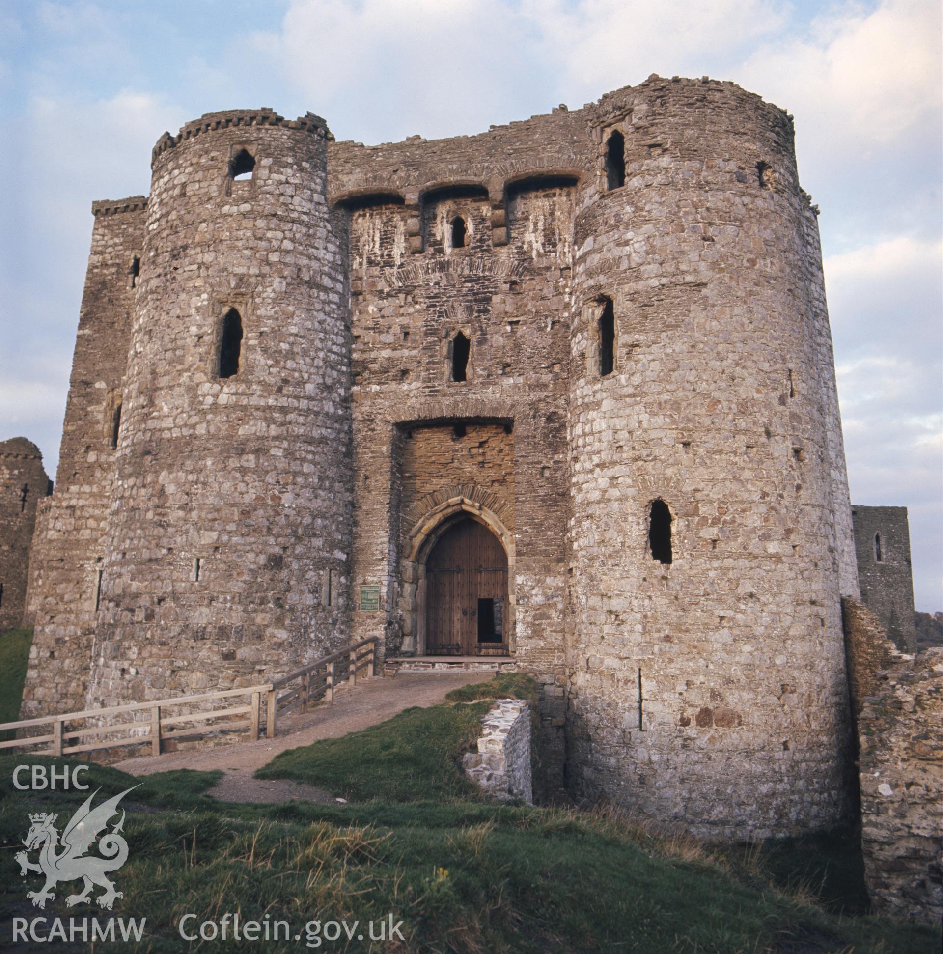 1 colour transparency showing view of Kidwelly Castle; collated by the former Central Office of Information.