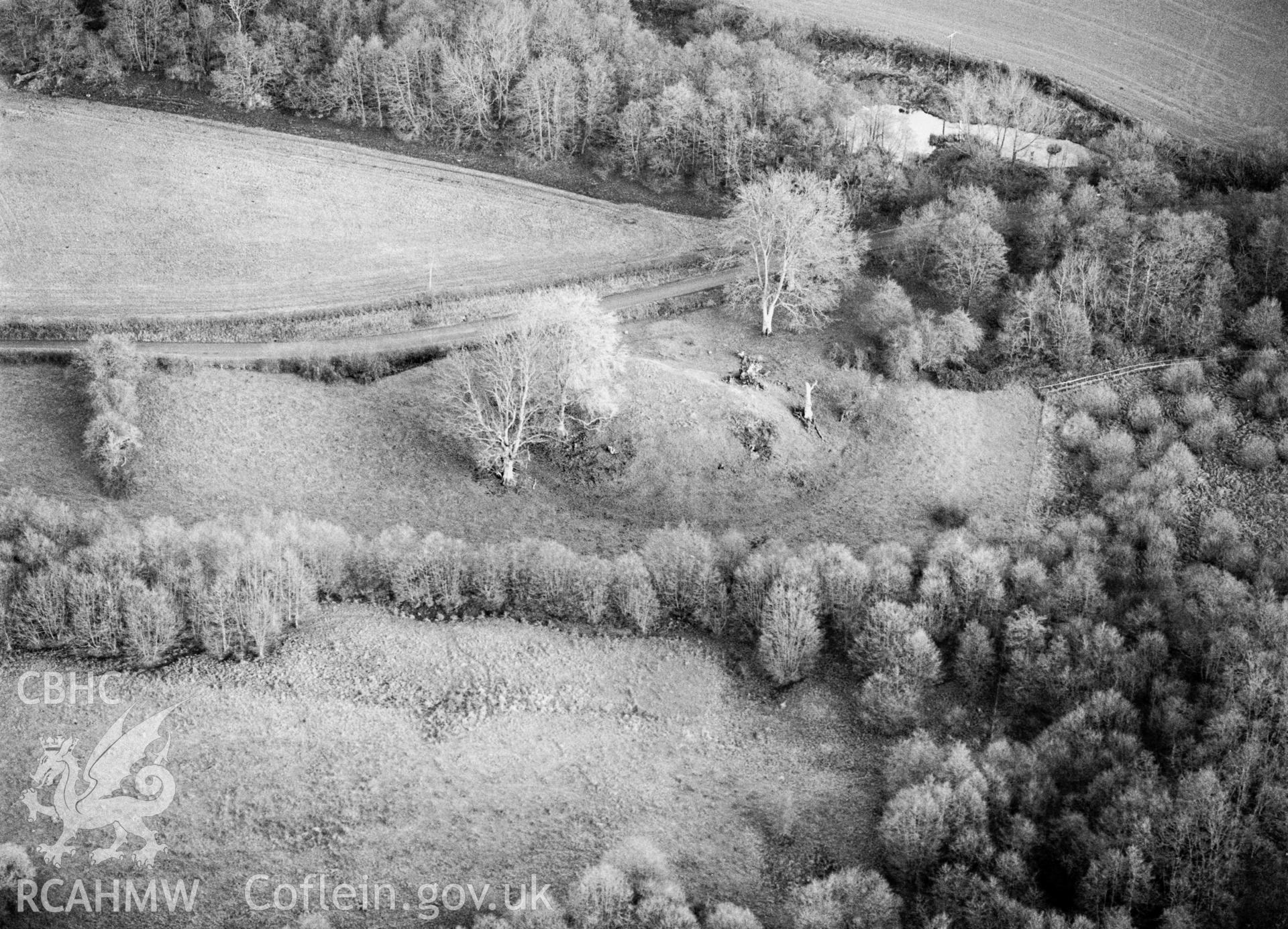 RCAHMW black and white oblique aerial photograph of Bogs Mount, taken by C R Musson, 27/12/1996.