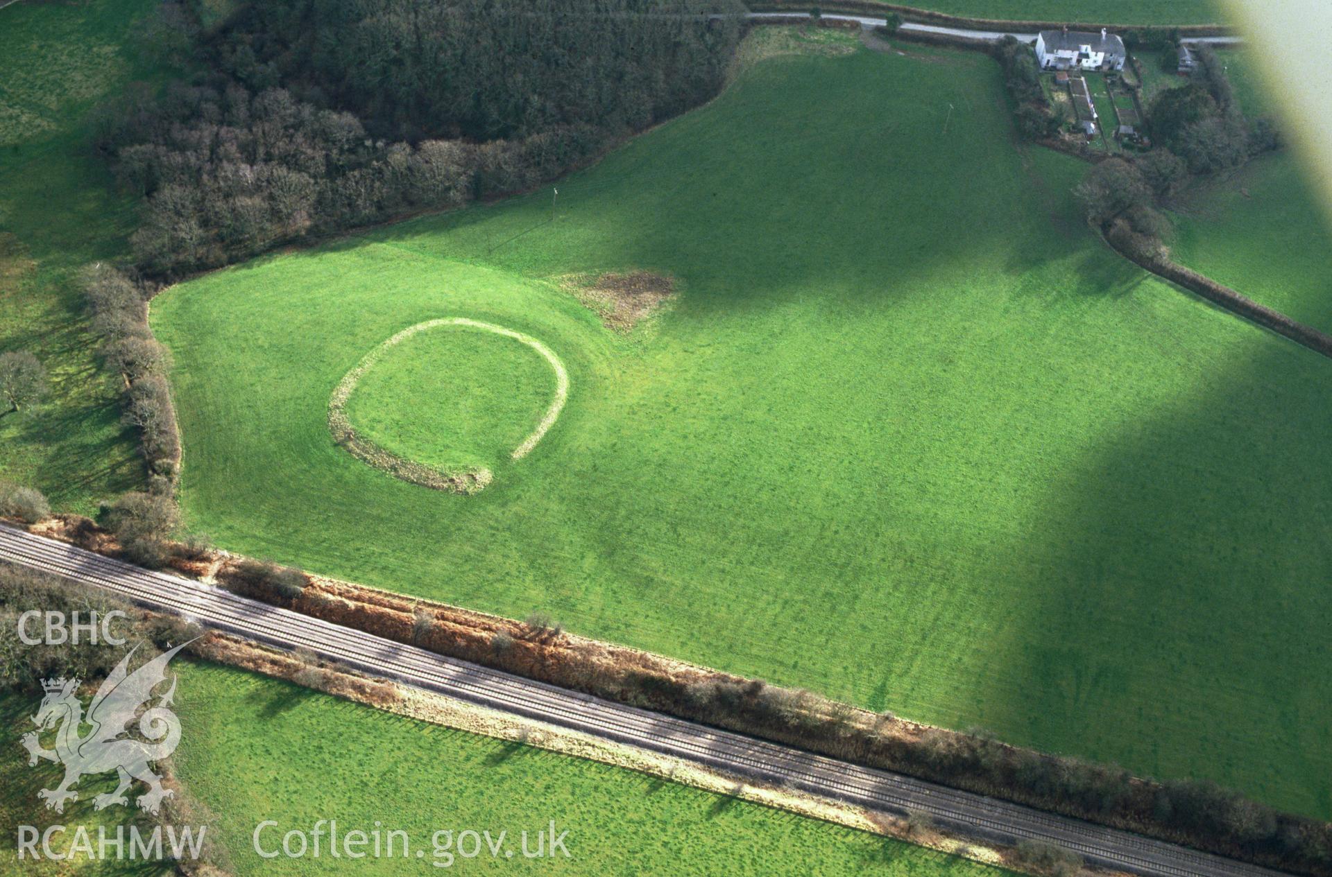 RCAHMW colour slide oblique aerial photograph of enclosure at Brynsyfni, Llawhaden, taken by C.R. Musson, 02/03/94