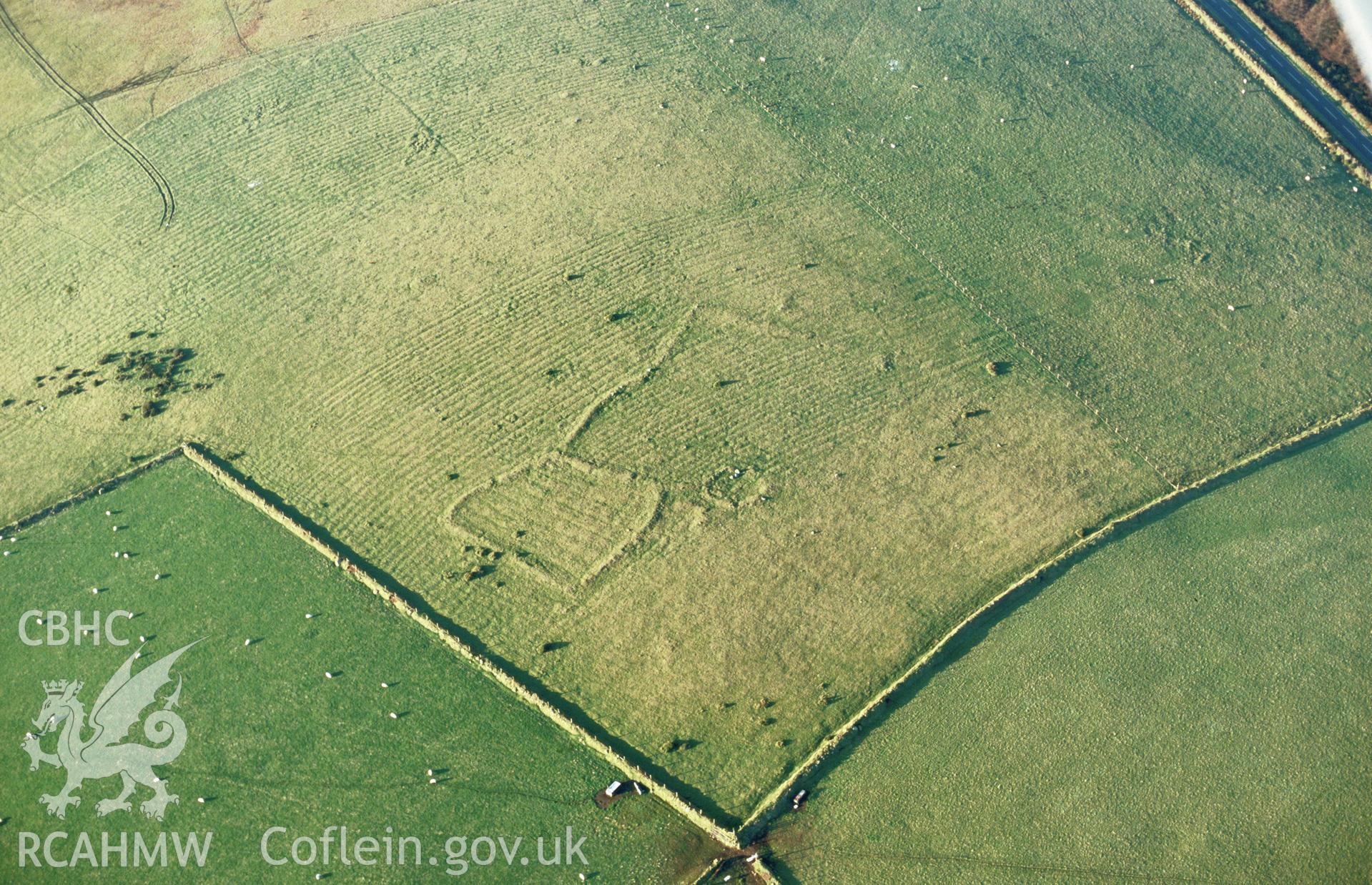 RCAHMW colour oblique aerial photograph of Mynydd Morvil enclosure, Puncheston. Taken by Toby Driver on 13/12/2002