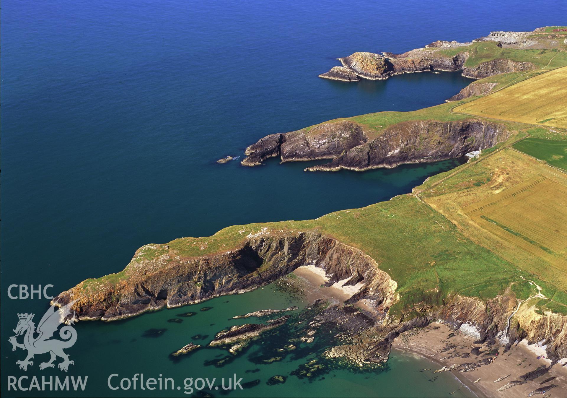 RCAHMW colour oblique aerial photograph of Porth Egr Promontory Fort taken by Toby Driver, 2000