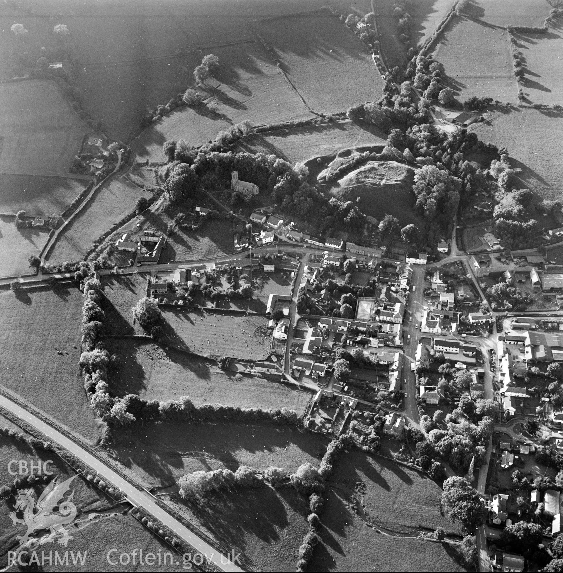 RCAHMW Black and white oblique aerial photograph of New Radnor, taken by CR Musson on 13/06/88